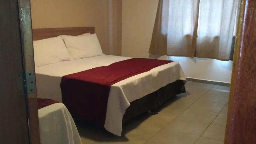 Bed in Itacuruçá Inn