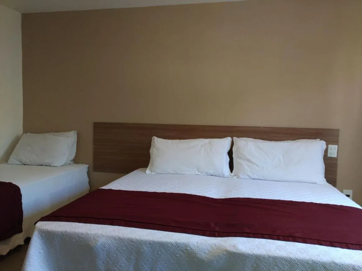 Bed in Itacuruçá Inn