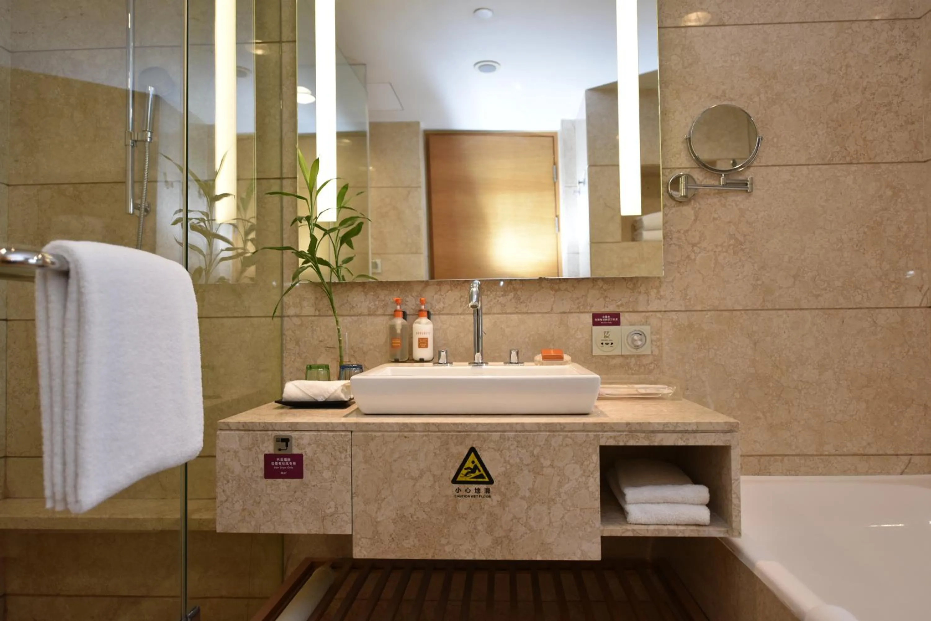 Bathroom in Crowne Plaza Zhongshan Wing On City by IHG