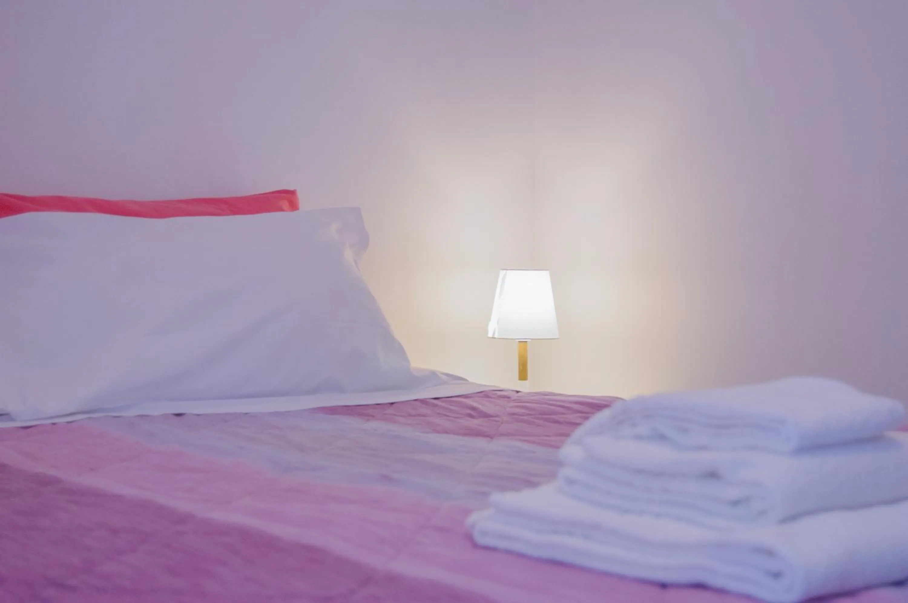 Bed in Melo Accommodations