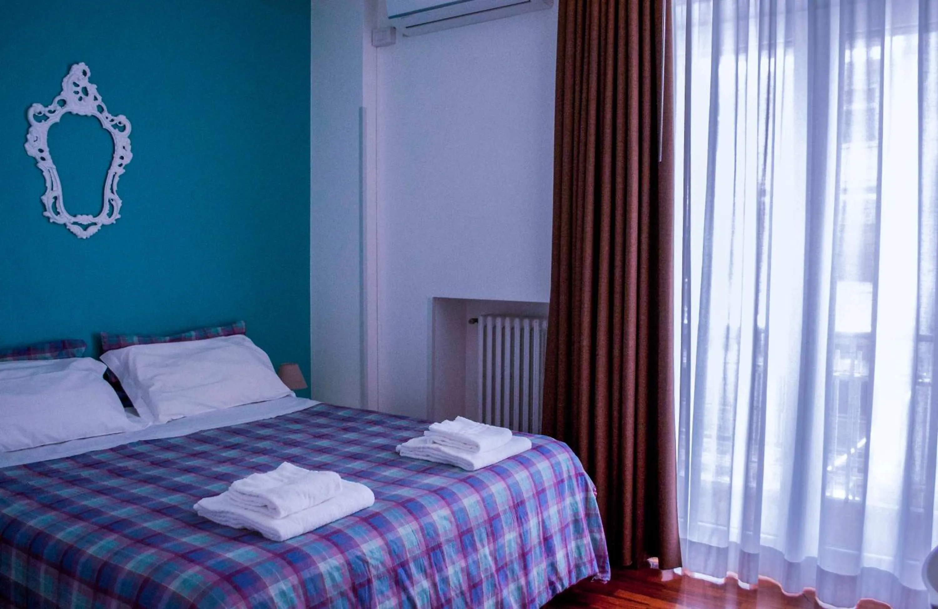 Bed in Melo Accommodations