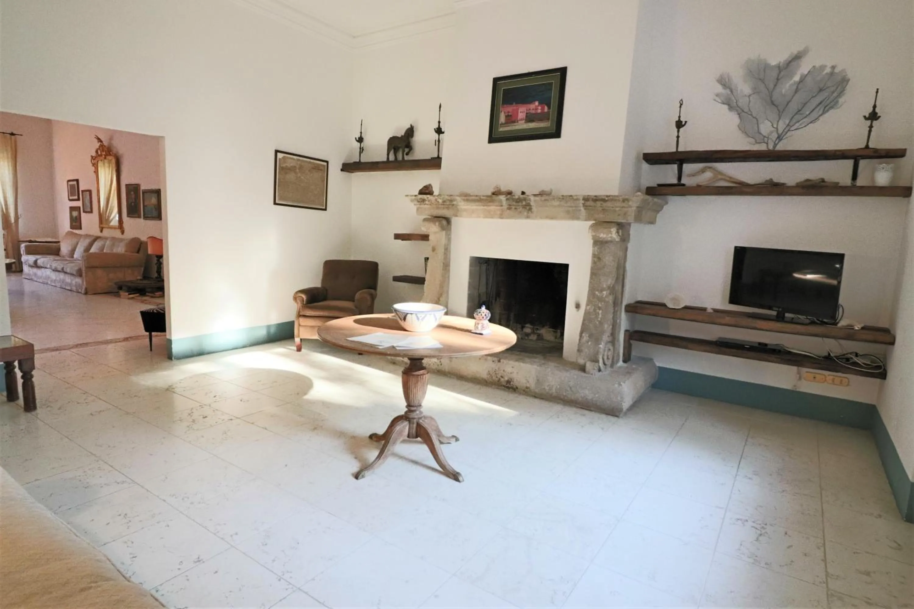 Communal lounge/ TV room in Relais Delle Rose