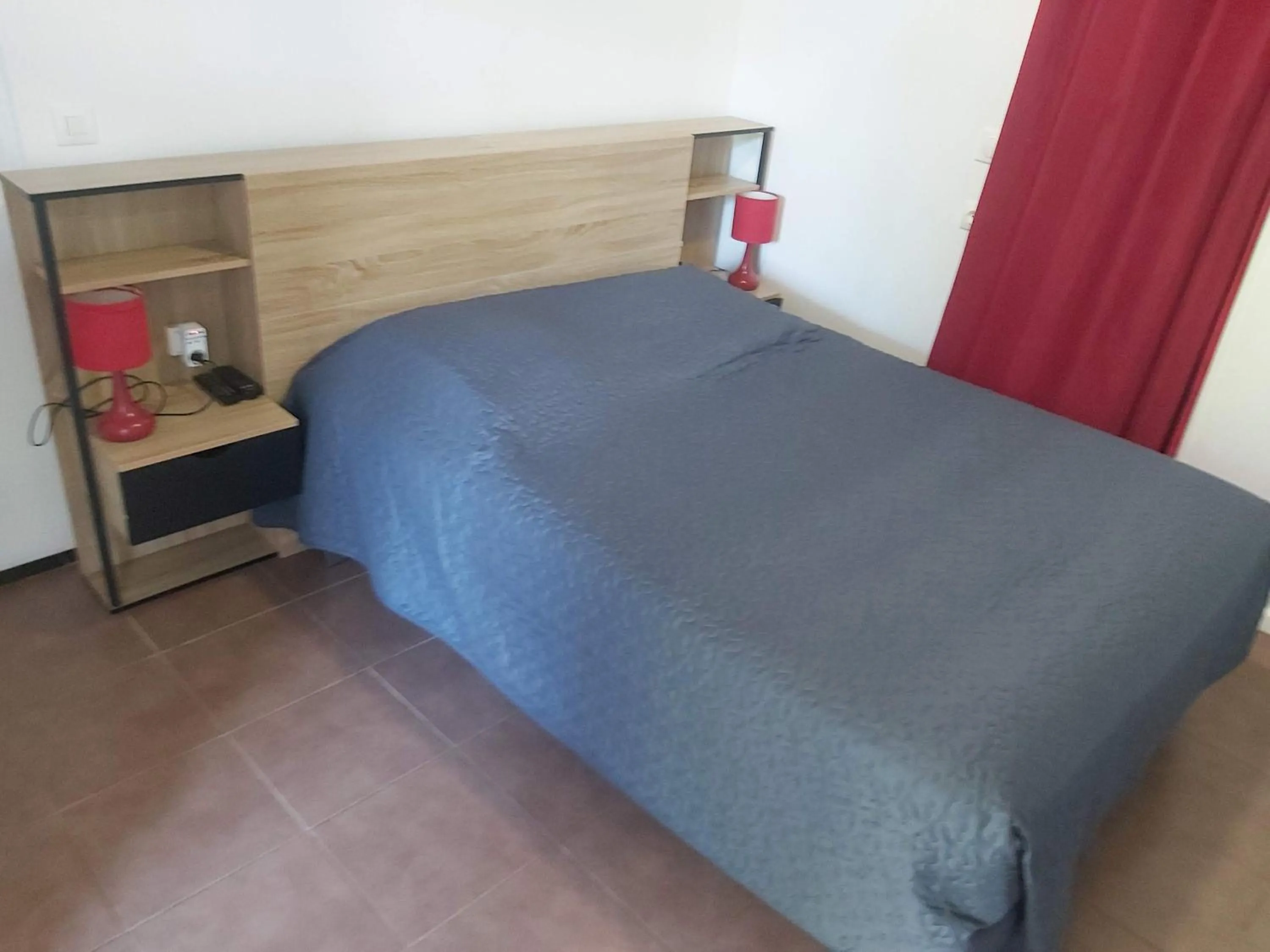 Bed in Au Petit Canal Fleuri