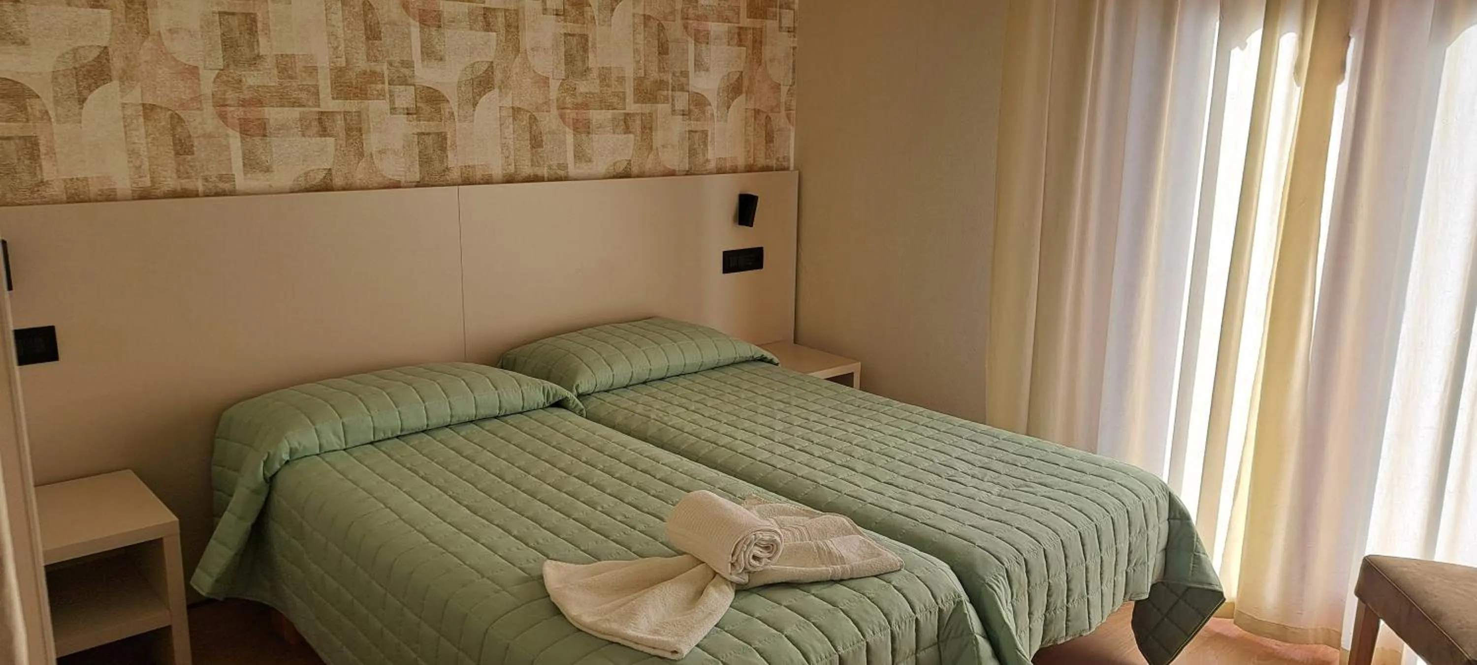 Bed in Garnì Casa Rabagno