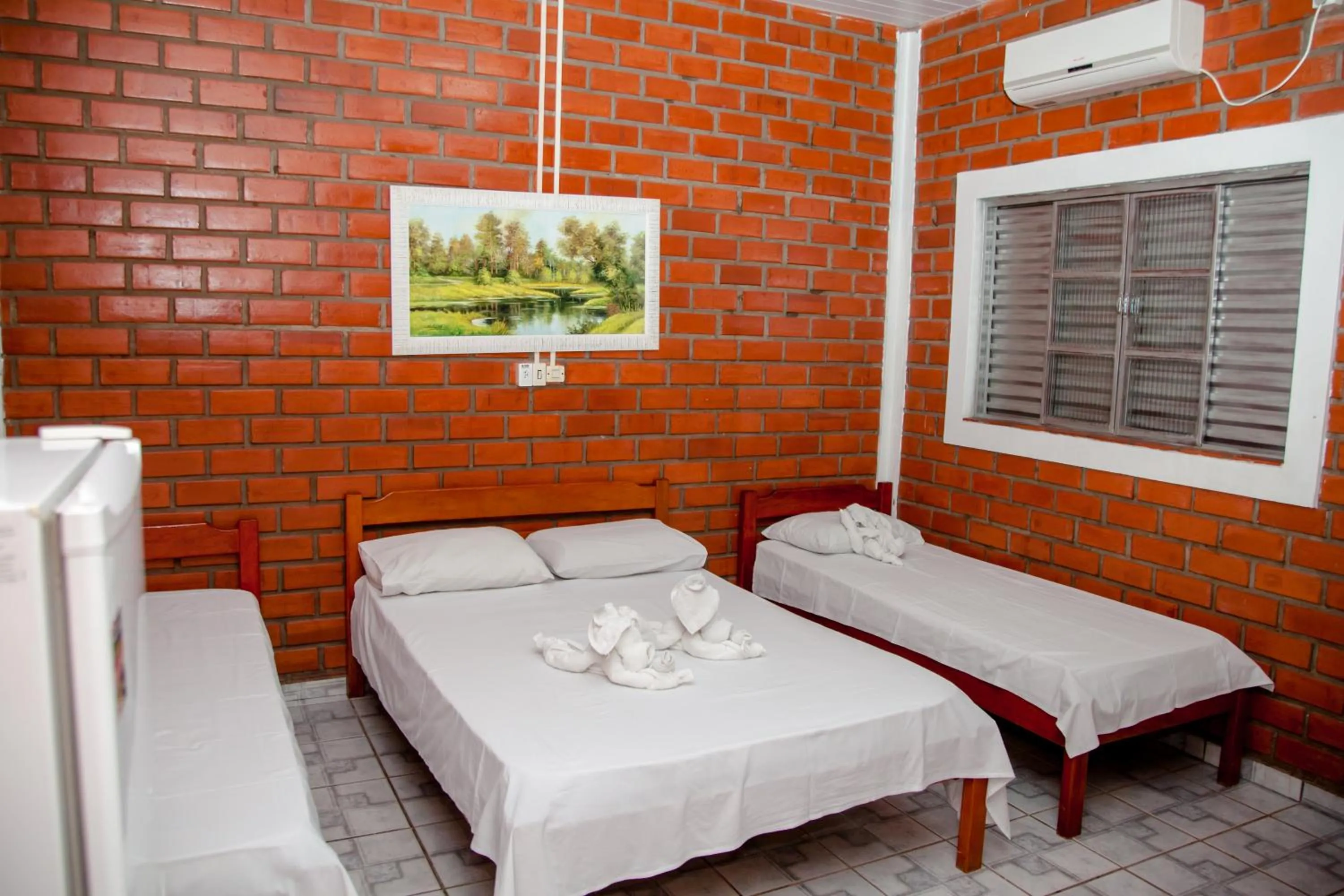 Bed in Pousada Sucuri