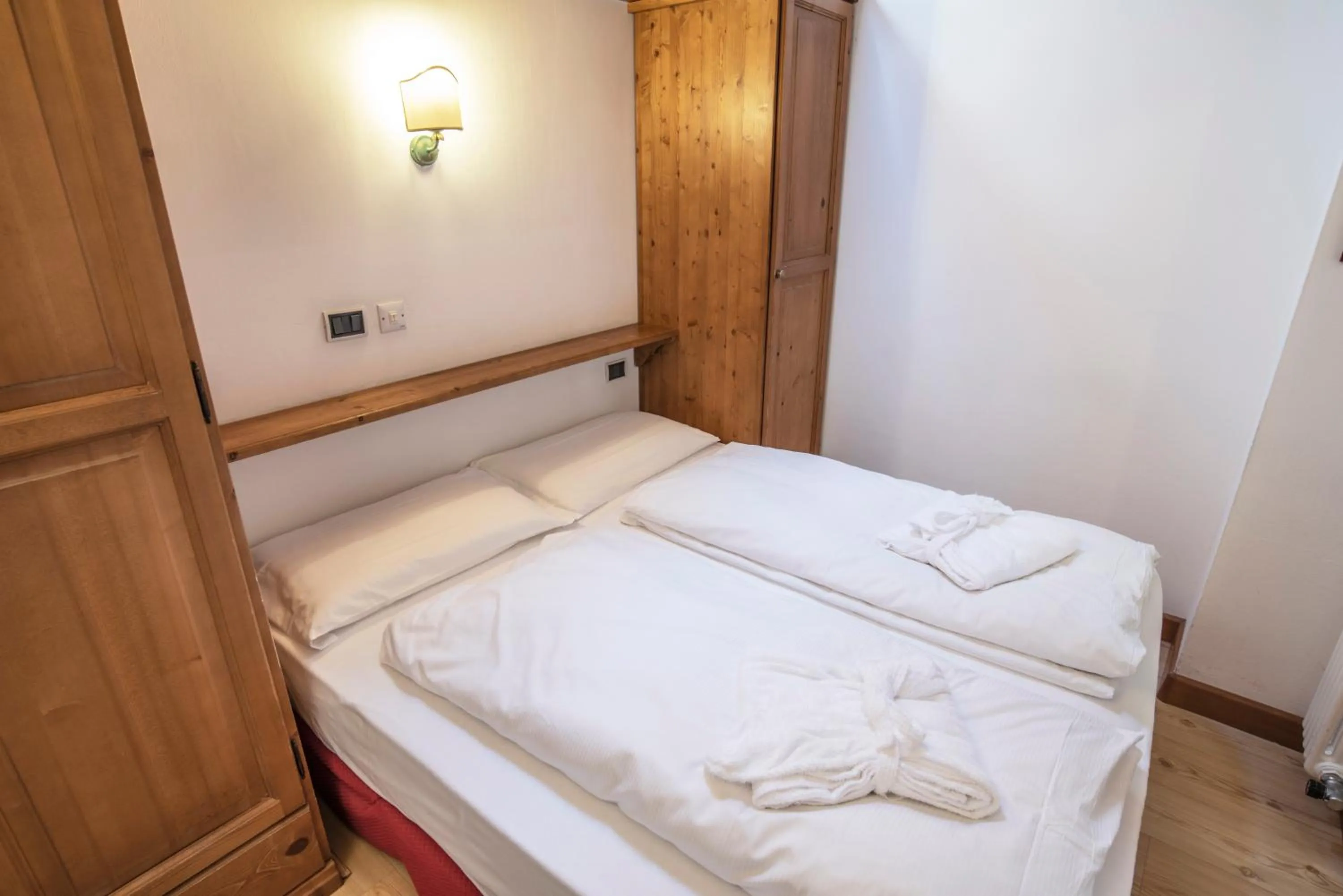 Bed in Sporting Aparthotel