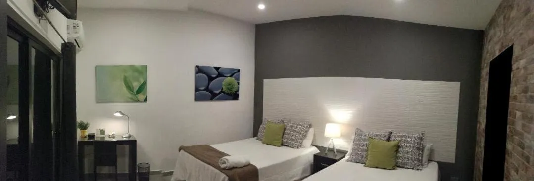 Photo of the whole room, Bed in Hotel Boutique Valverde Santa Elena