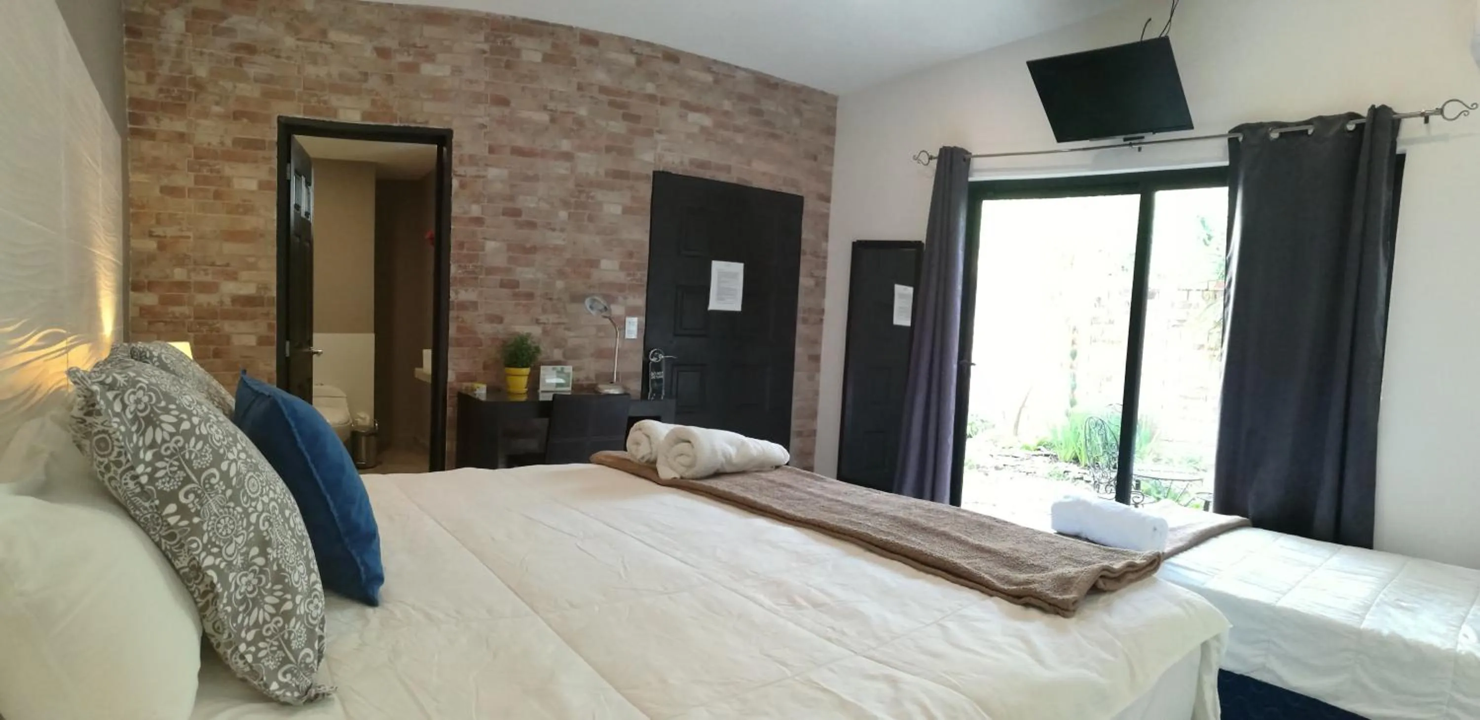 Decorative detail, Bed in Hotel Boutique Valverde Santa Elena