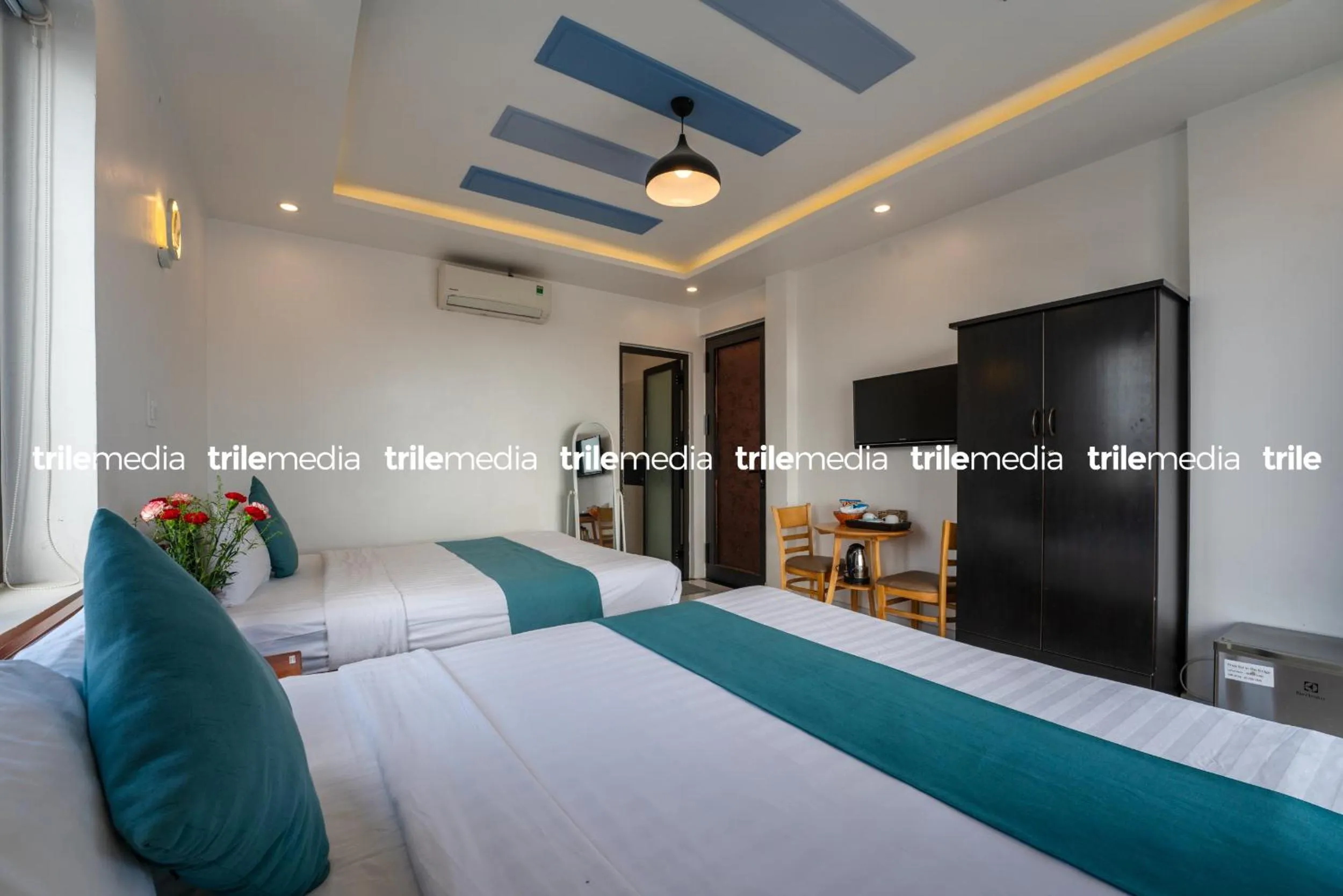 Communal lounge/ TV room, Bed in Rockmouse Centre River Villa Hoi An