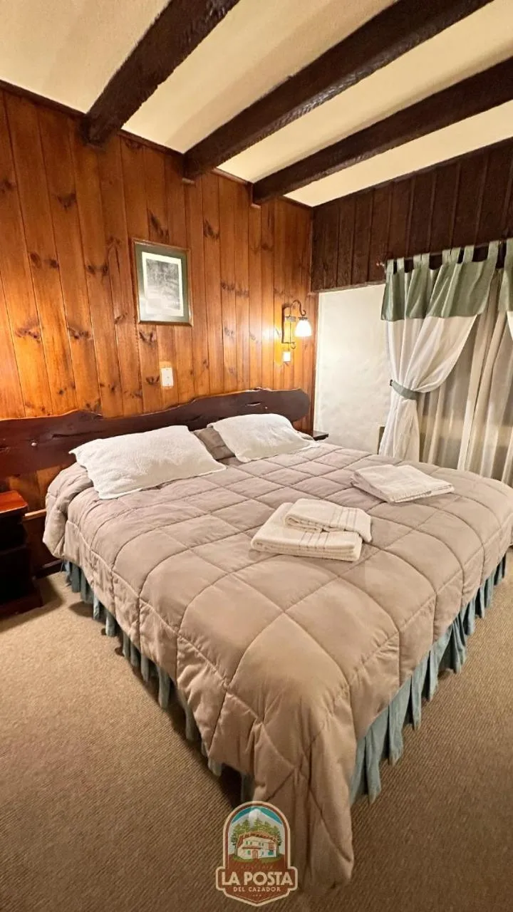 Bed in Hostería La Posta Del Cazador