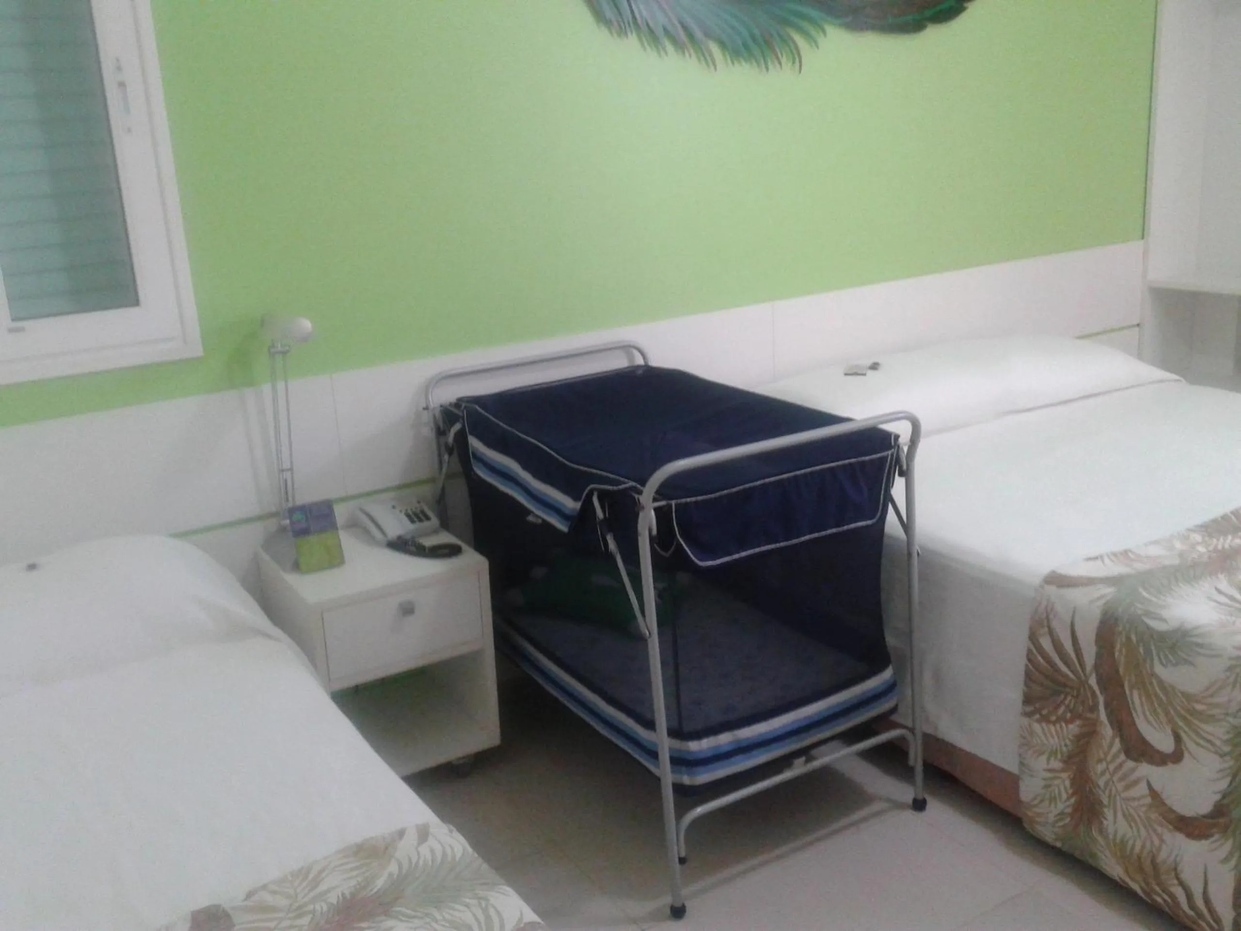 Decorative detail, Bed in Coqueiros Express Hotel