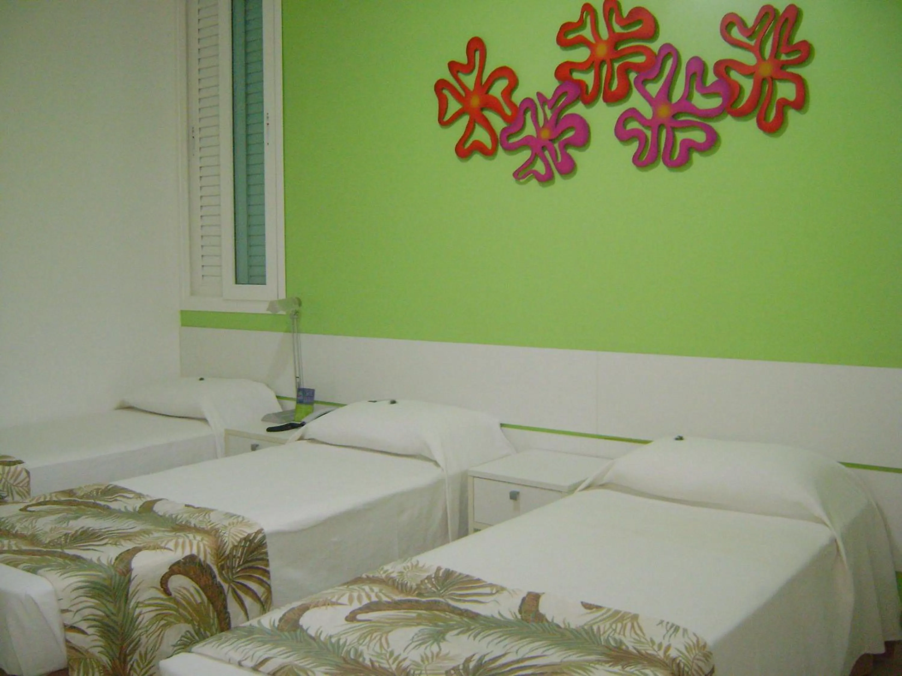 Bed in Coqueiros Express Hotel