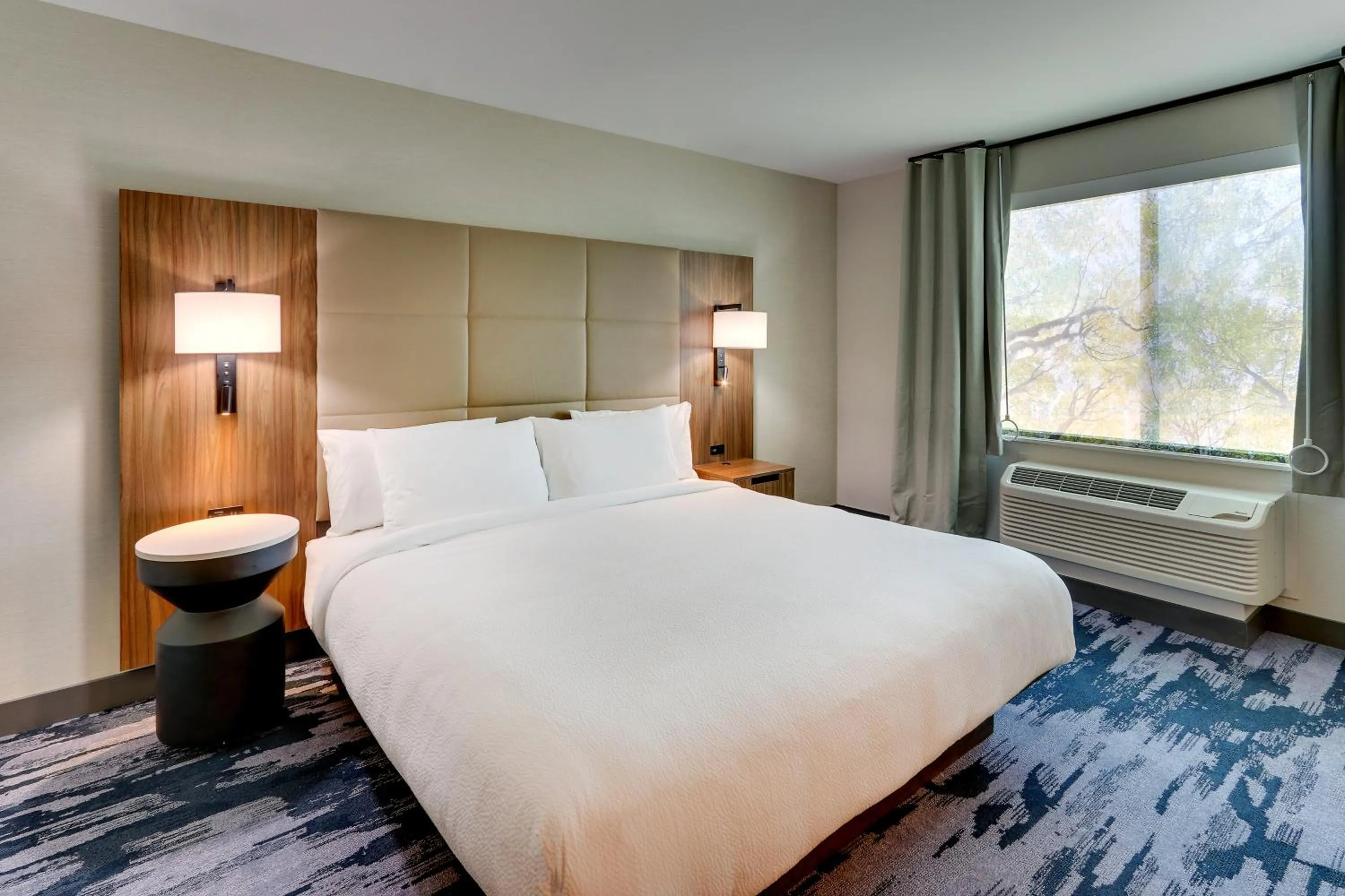 Bed in Fairfield Inn & Suites by Marriott Atlanta Fairburn