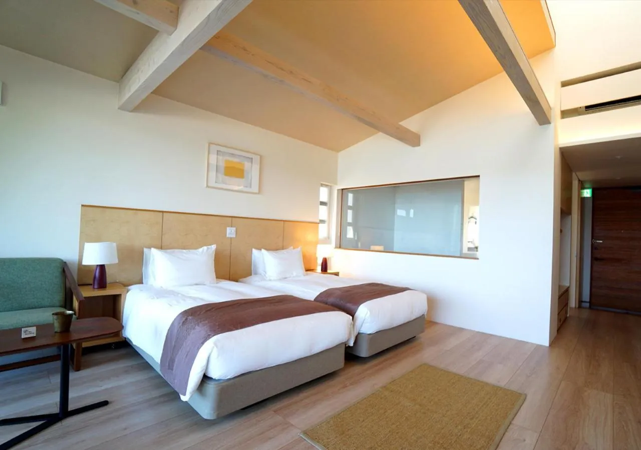 Photo of the whole room, Bed in Miru Amami