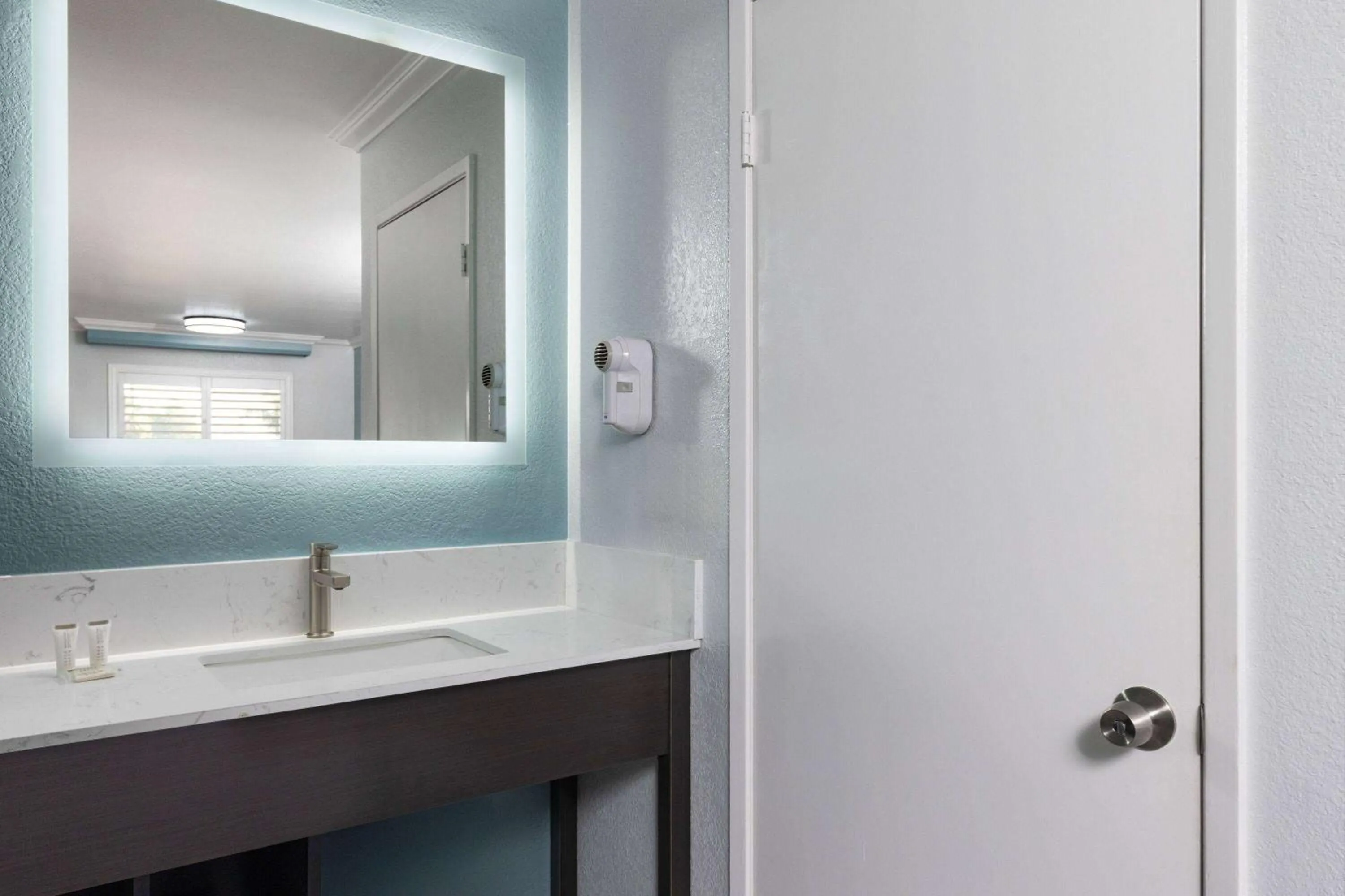 Bathroom in Travelodge by Wyndham Lemoore Near Naval Air Station