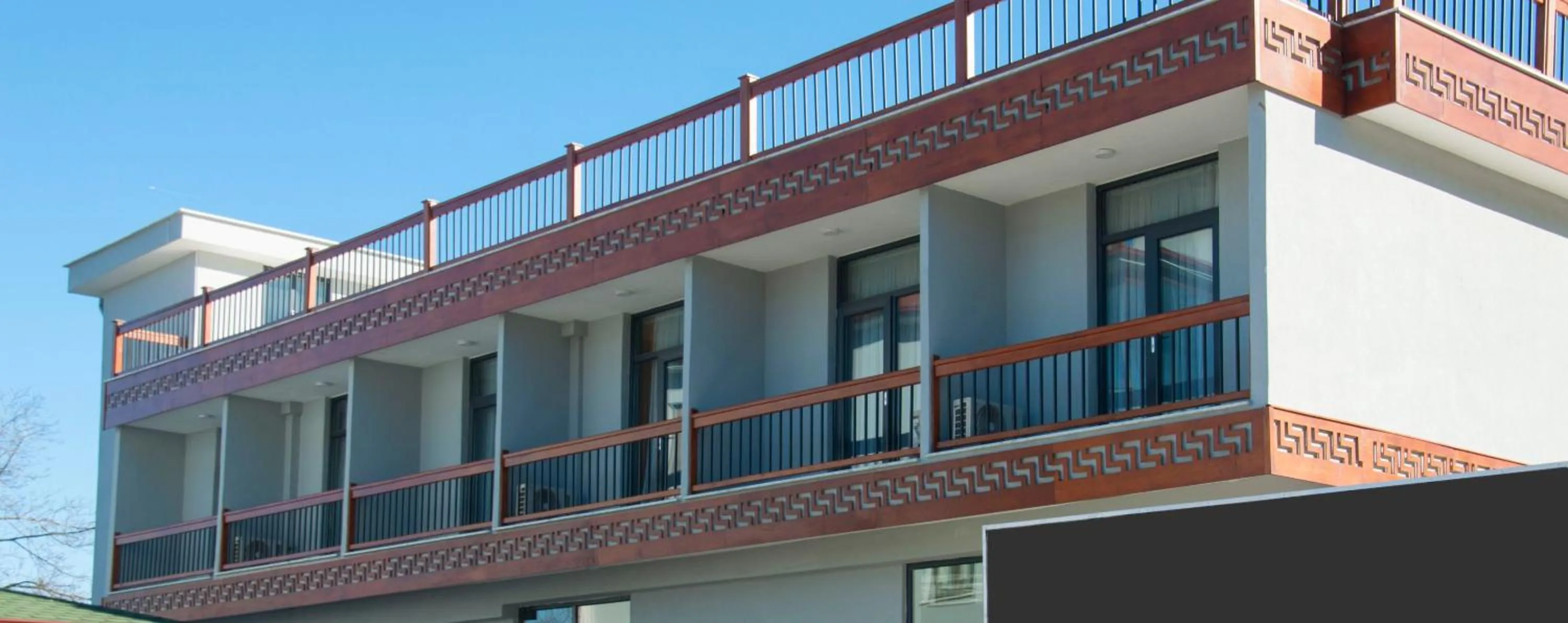 Property building in Room Room Motel