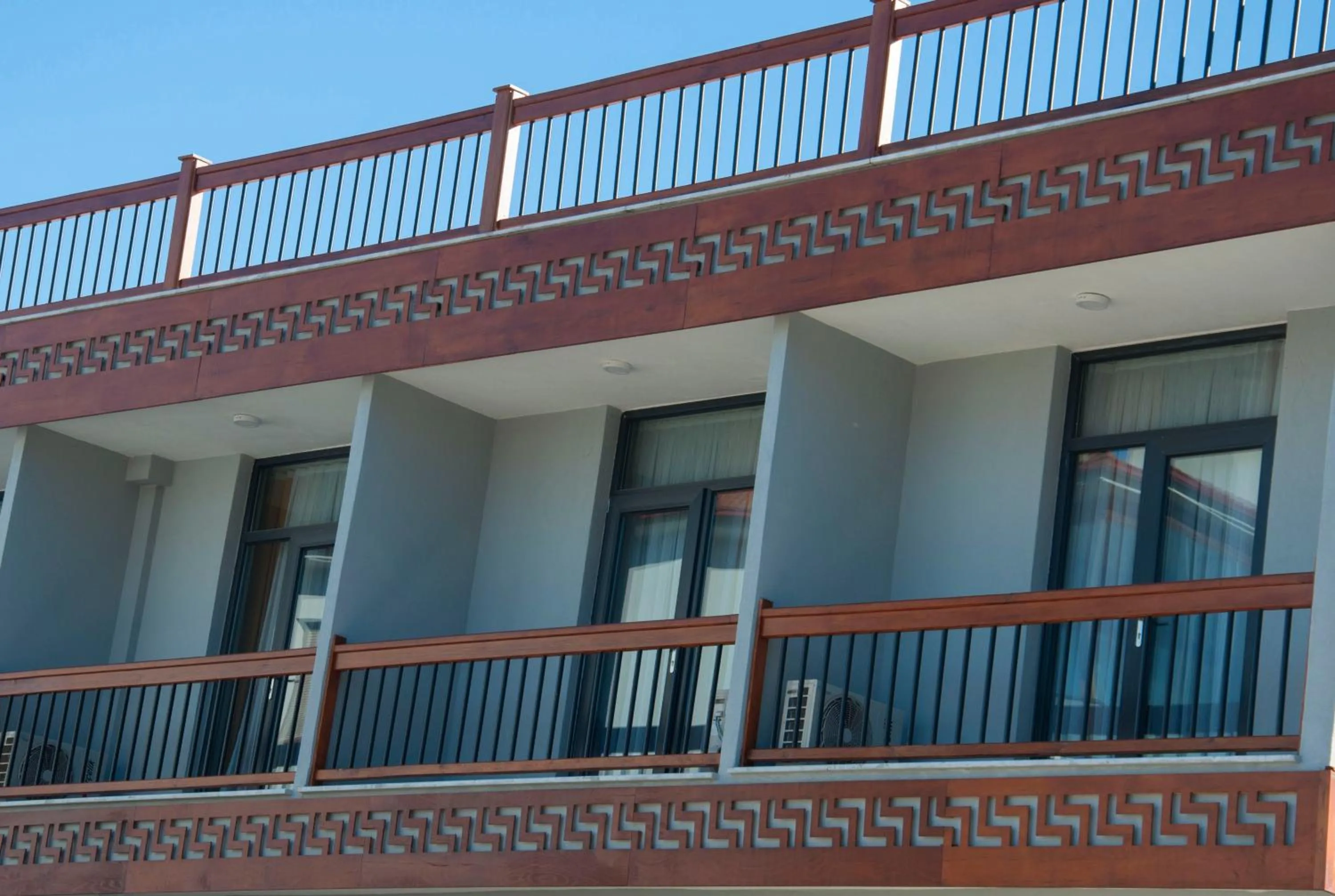 Property building in Room Room Motel