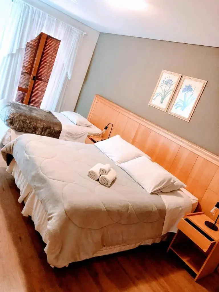 Triple Room with Garden View in Pousada Condado Brasileiro Triple Room with Garden View in Pousada Condado Brasileiro