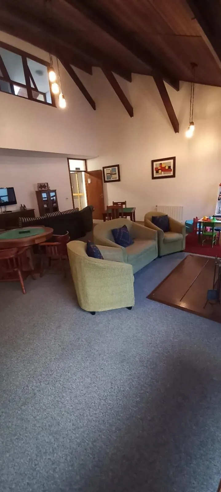 Communal lounge/ TV room in Pousada Condado Brasileiro
