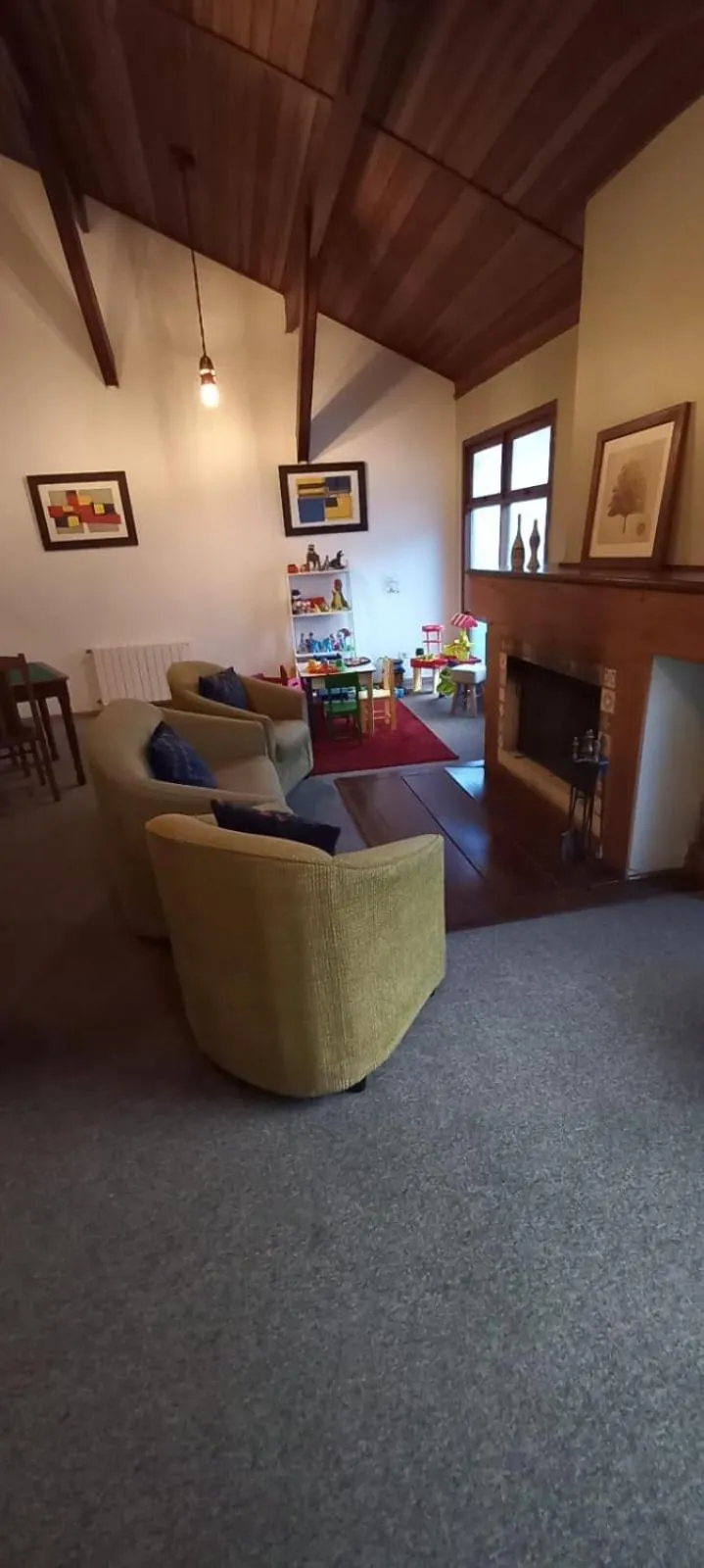 Communal lounge/ TV room in Pousada Condado Brasileiro