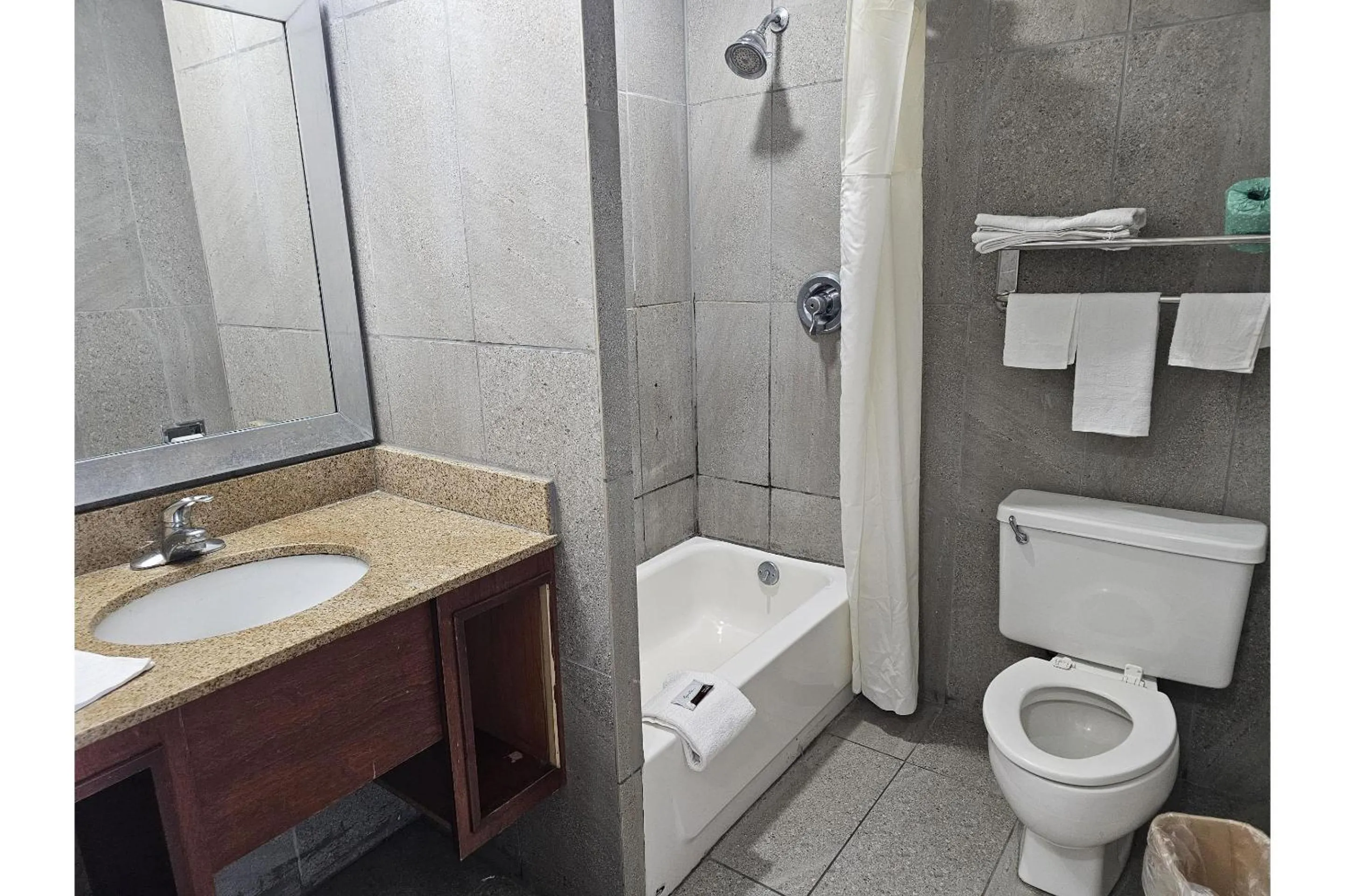 Bathroom in Travel Inn By OYO Omaha