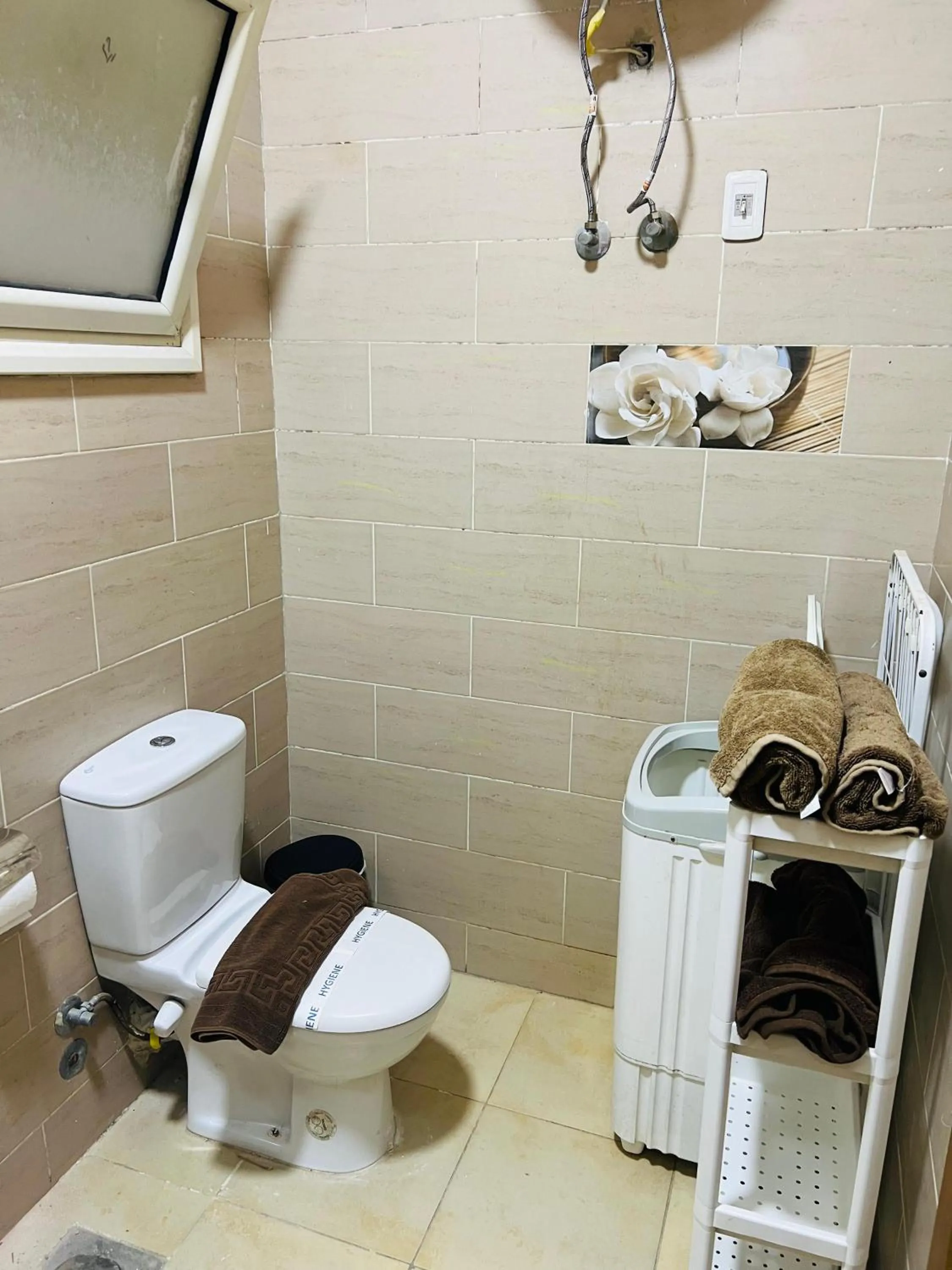 Toilet in Lilly Apartments