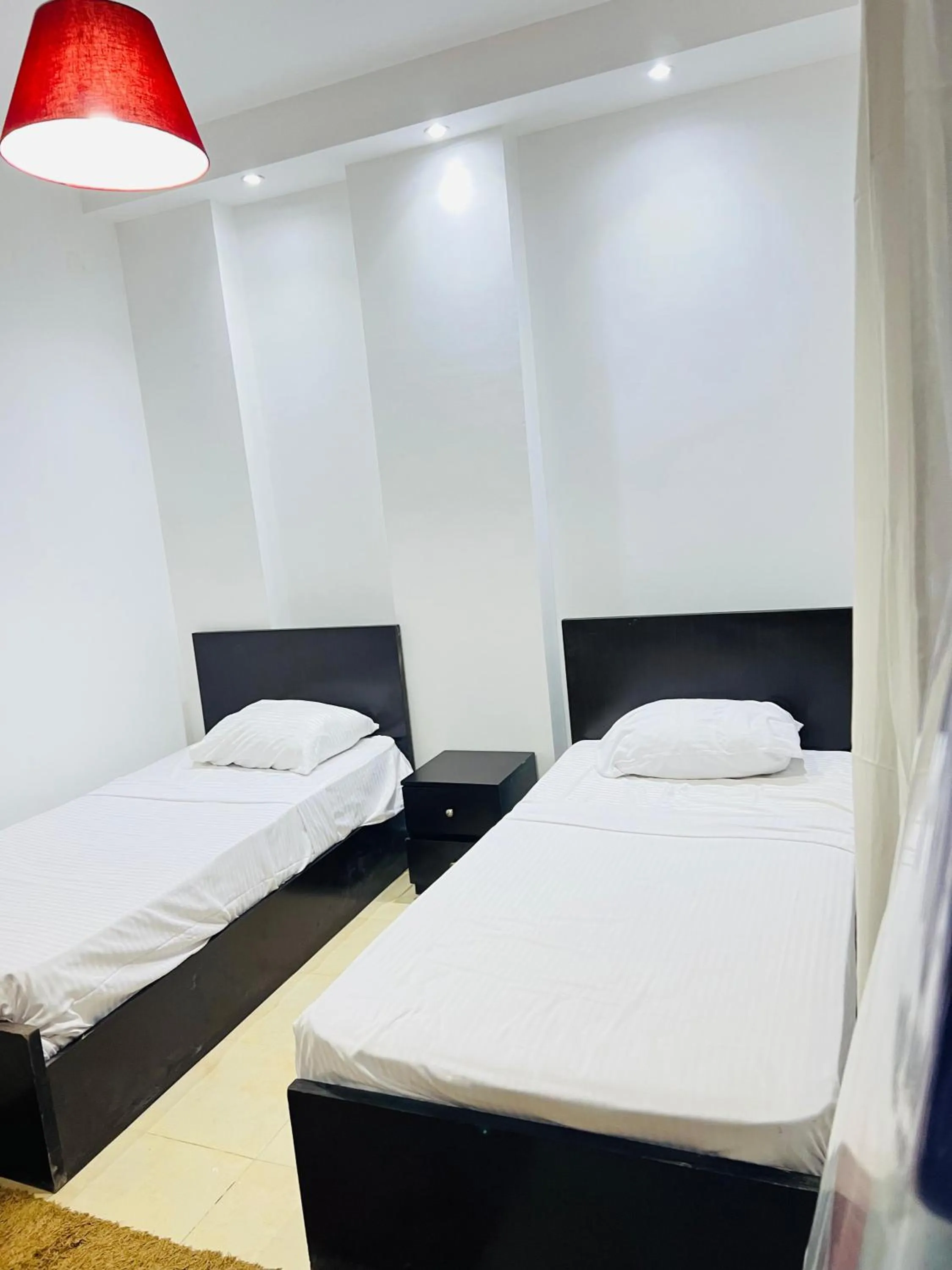 Bed in Lilly Apartments