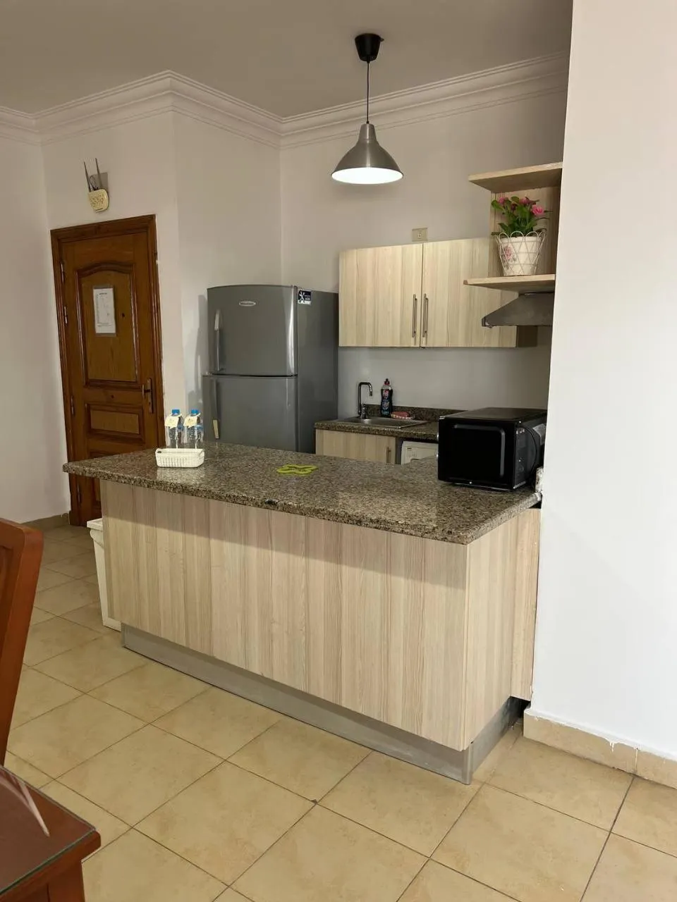 Kitchen or kitchenette in Lilly Apartments