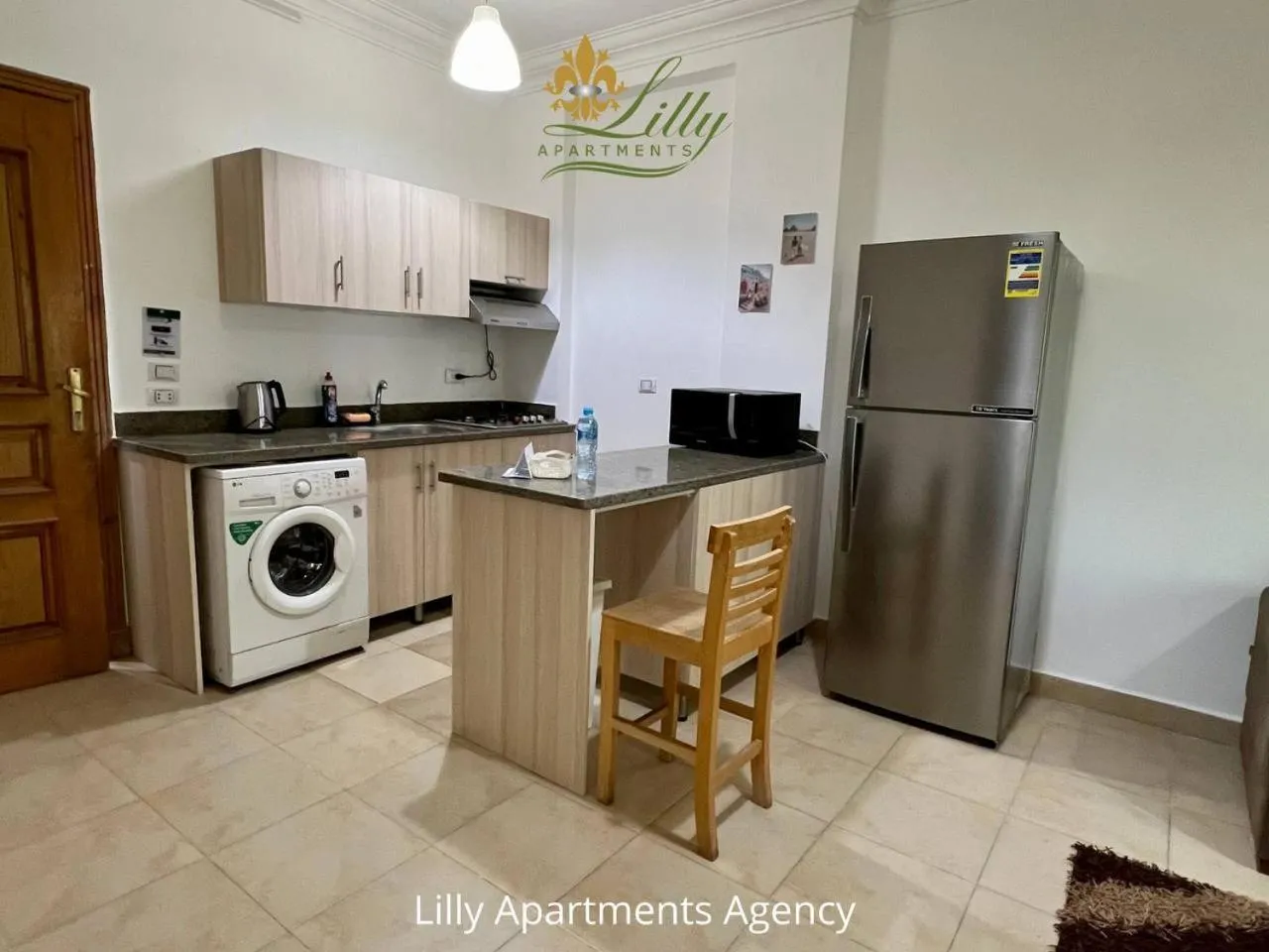 Kitchen or kitchenette in Lilly Apartments
