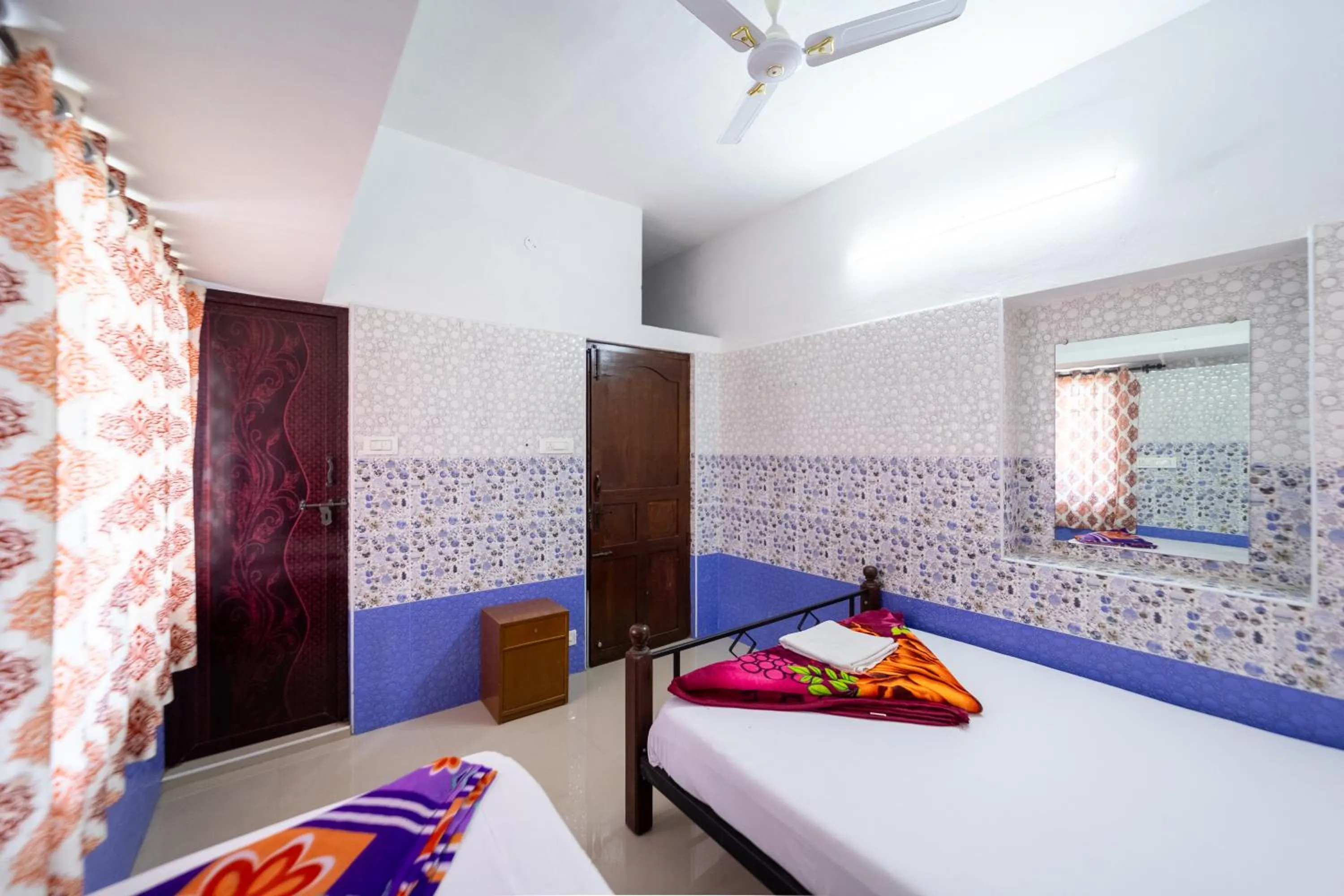 Photo of the whole room, Bed in Sri Nandha Luxury Comforts