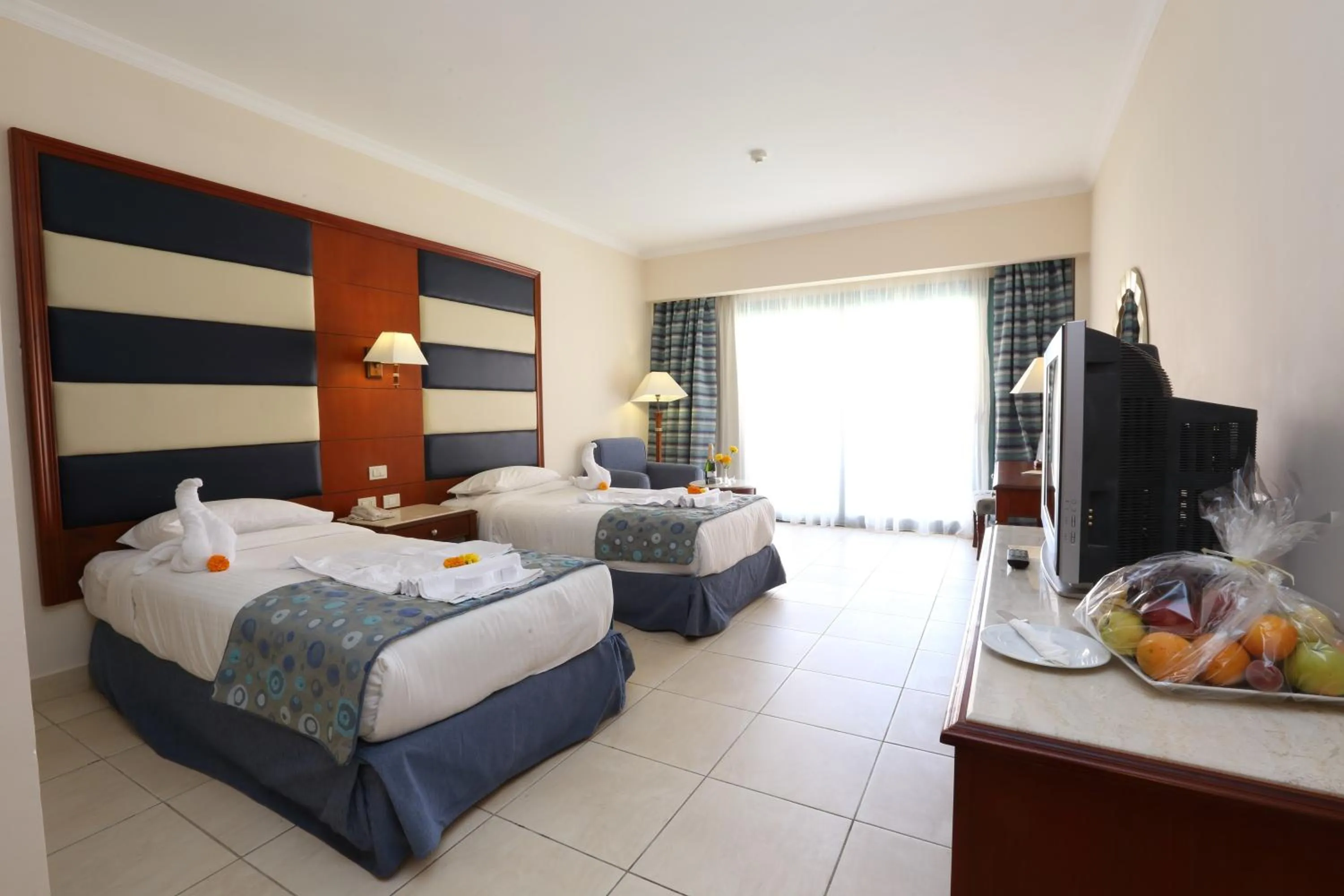 Photo of the whole room, Bed in Rehana Sharm Resort - Aquapark & Spa - Couples and Family Only -Premium Ultra All-Inclusive 24H