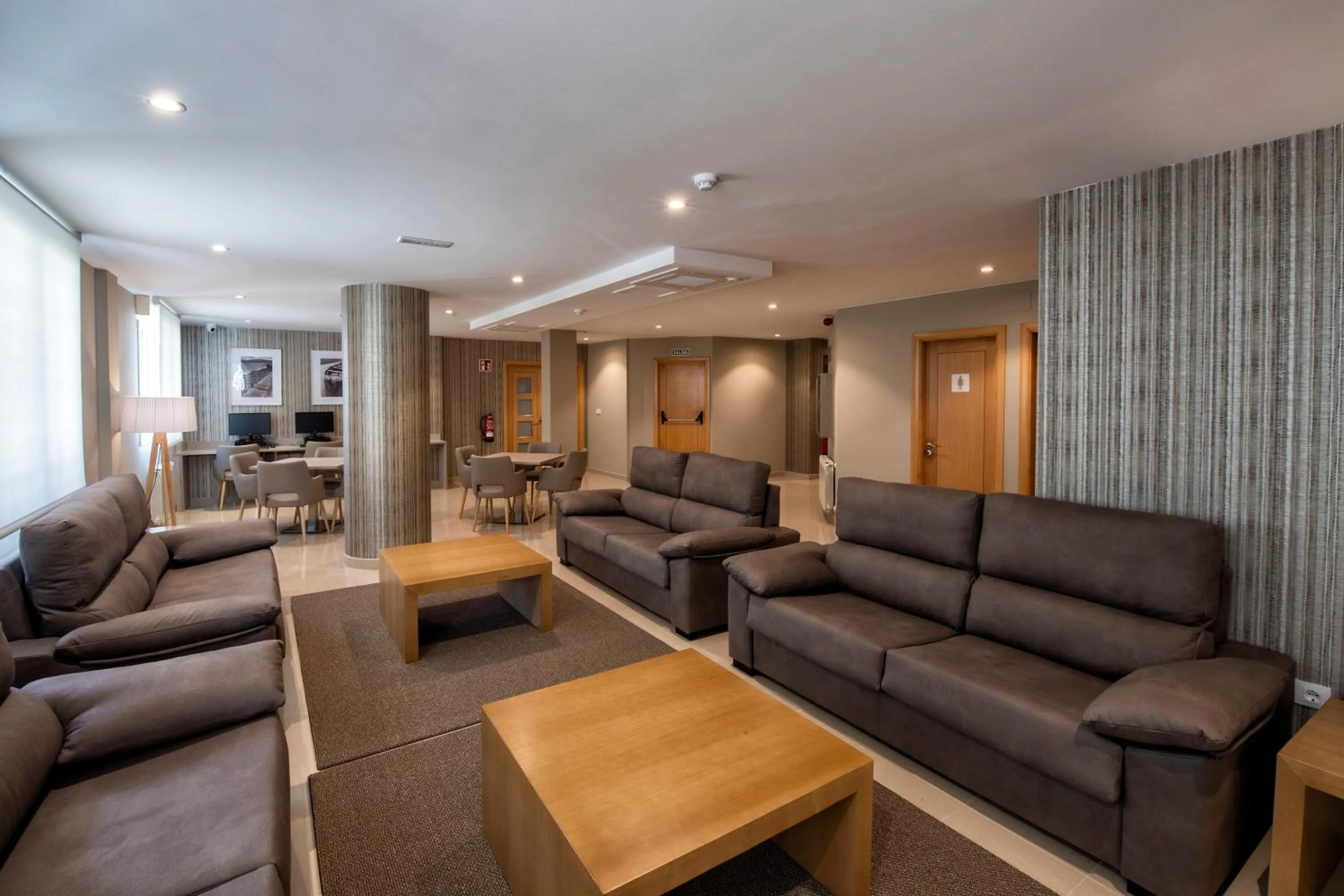 Communal lounge/ TV room in Apartamentos VIDA Mar de Laxe