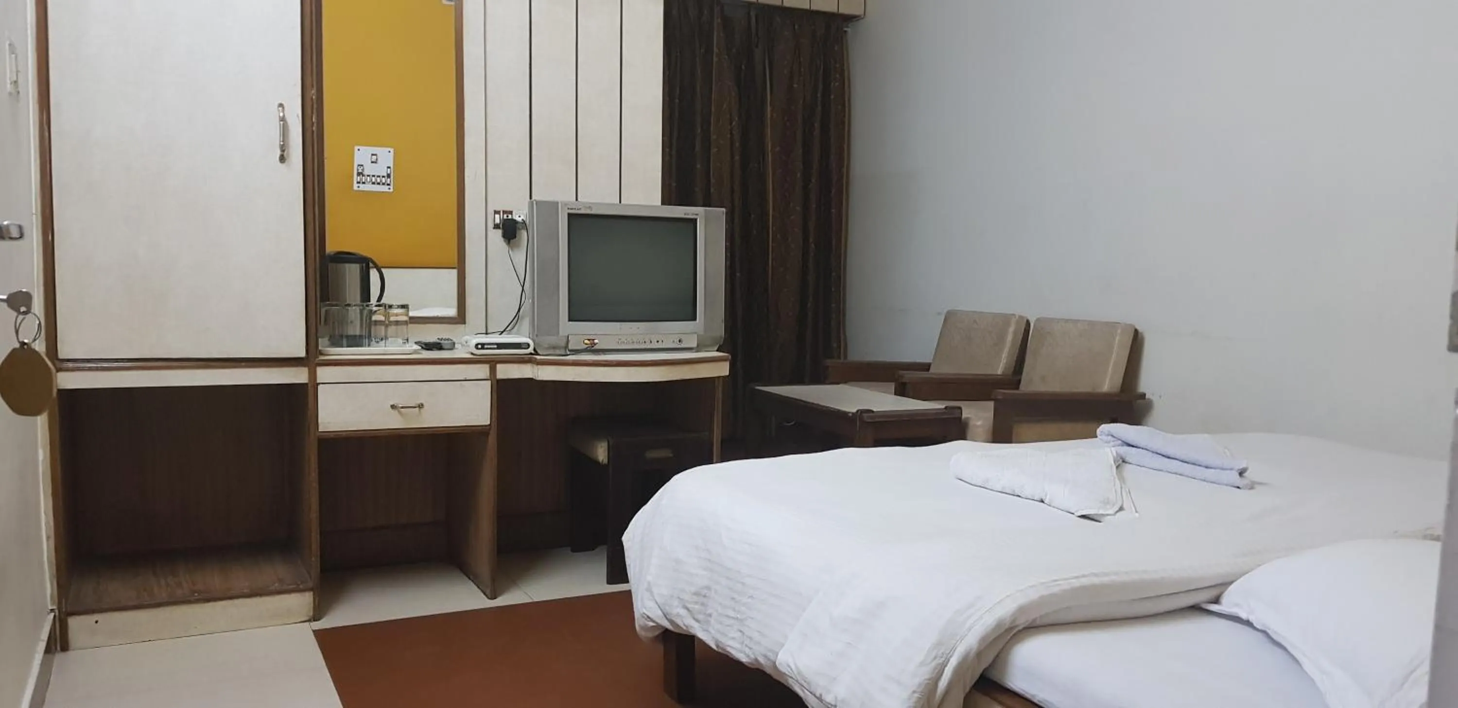 Bed in Hotel Midtown