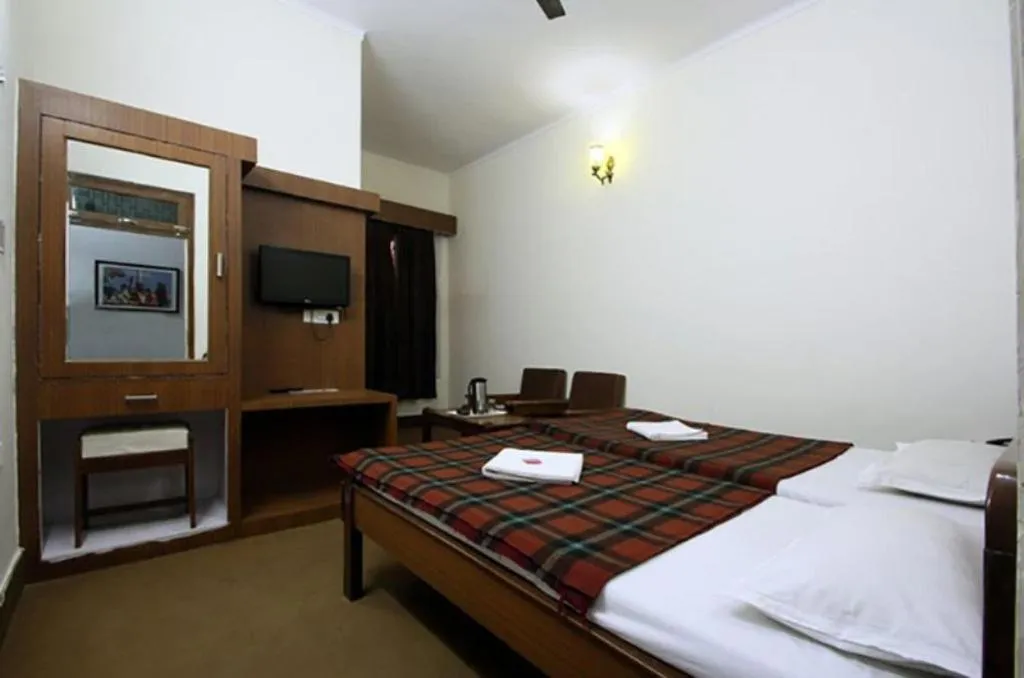 Bed in Hotel Midtown