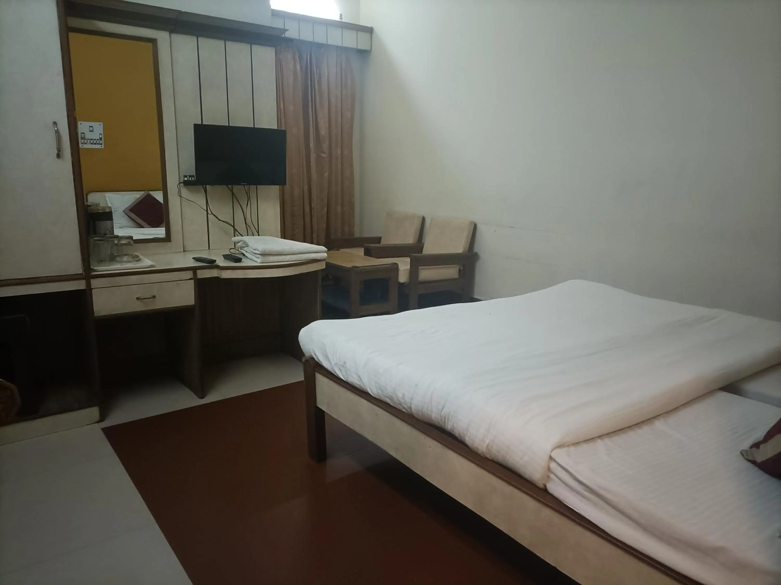 Bed in Hotel Midtown