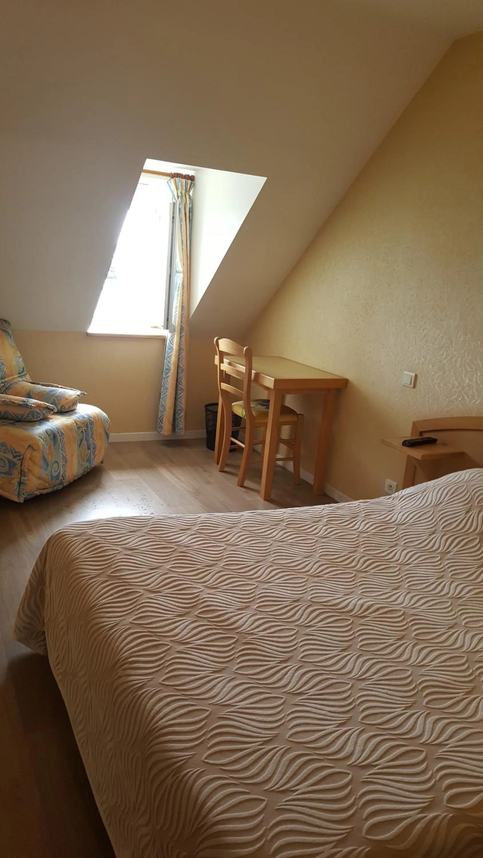 Property building, Bed in Hotel La Renaissance