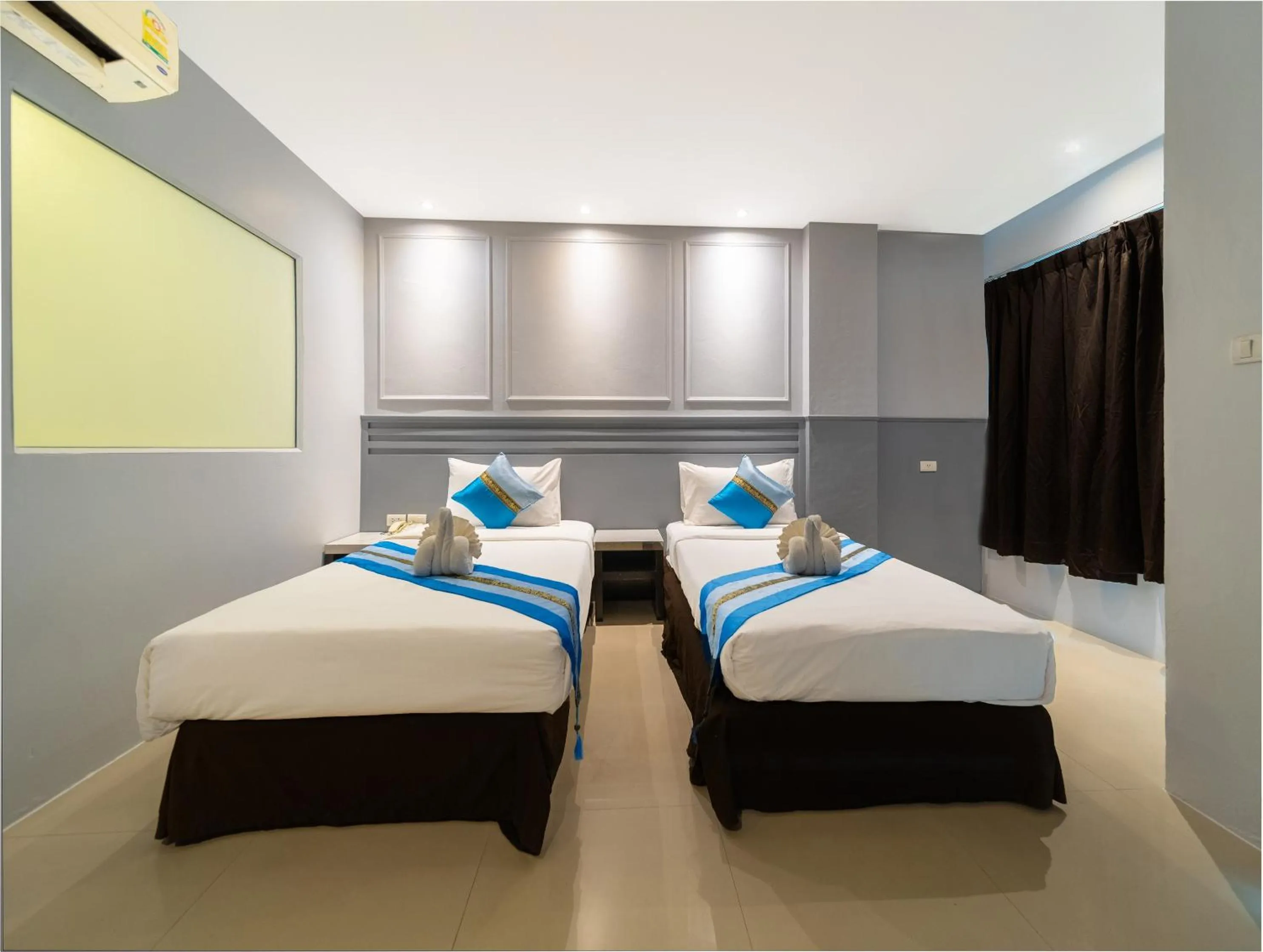 Bed in FunDee Boutique Hotel