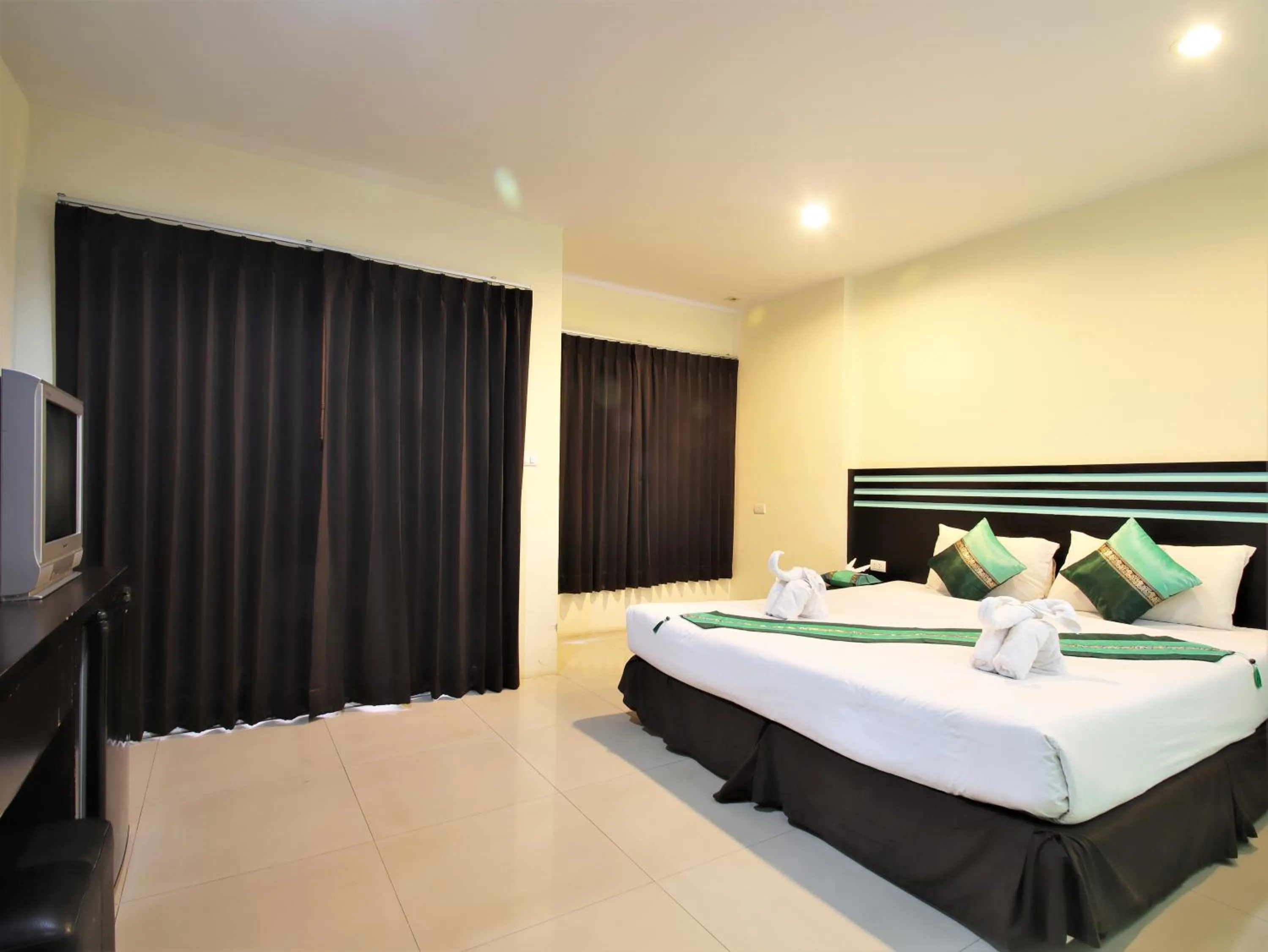 Bed in FunDee Boutique Hotel