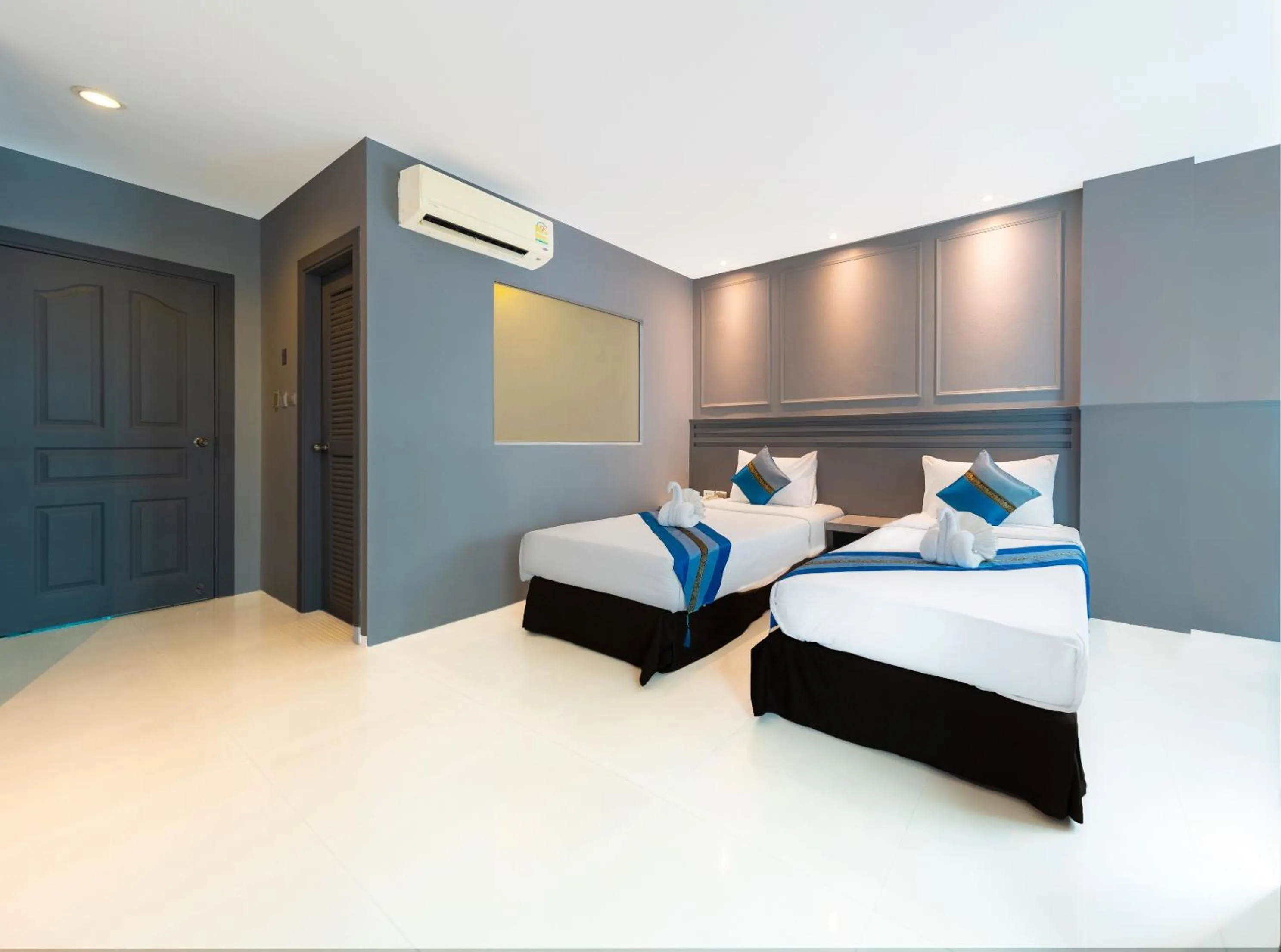 Bed in FunDee Boutique Hotel