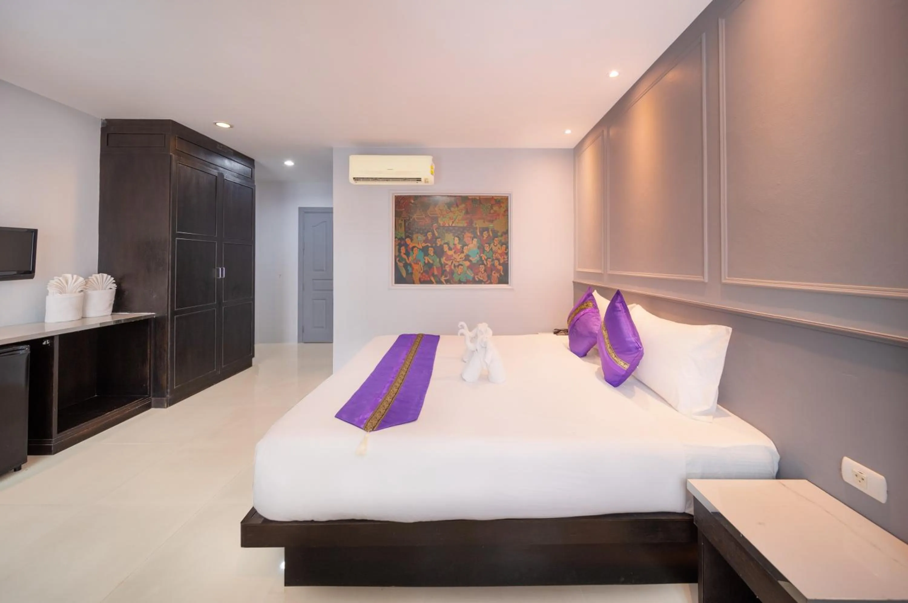 Bed in FunDee Boutique Hotel