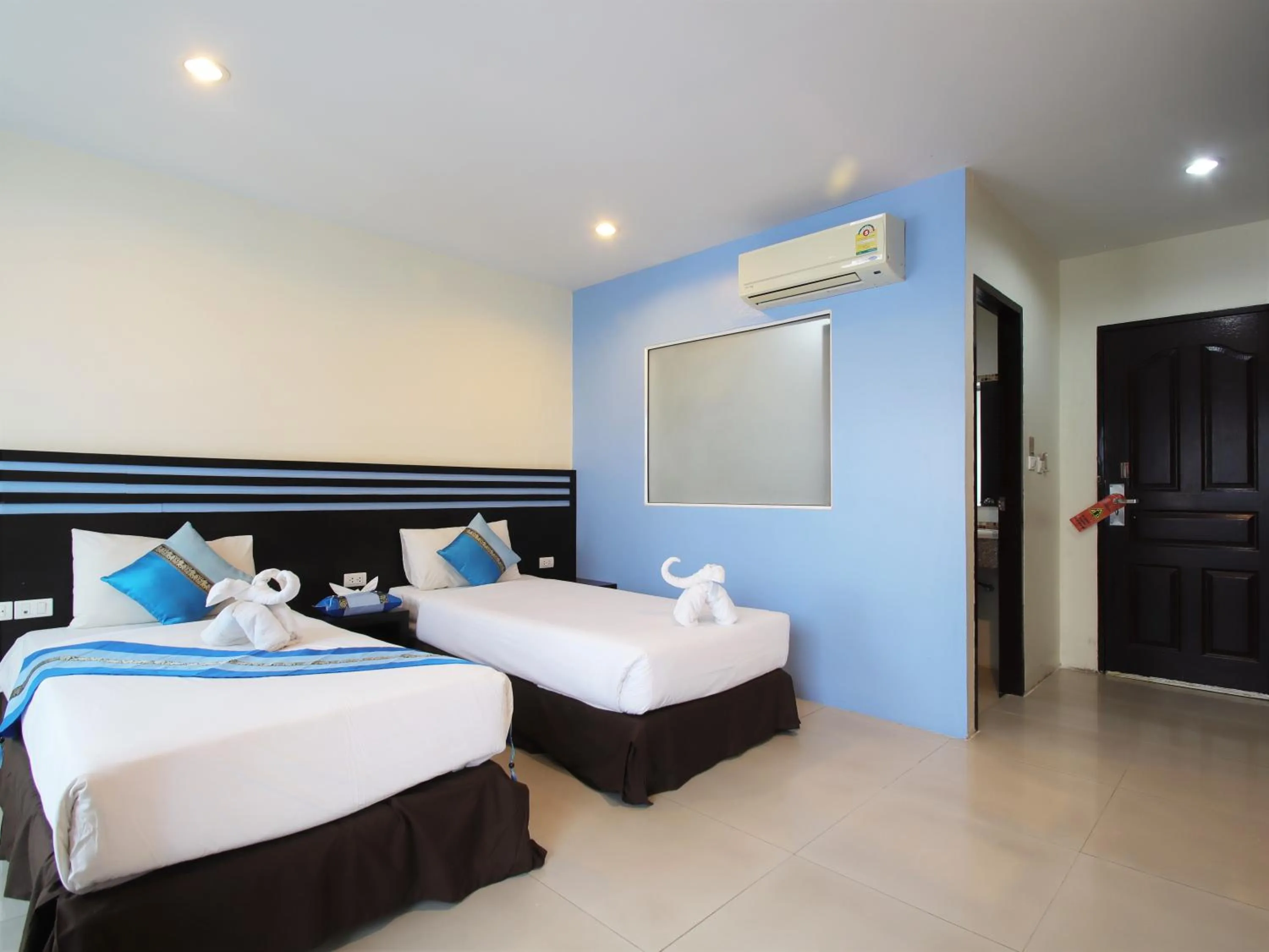 Bed in FunDee Boutique Hotel