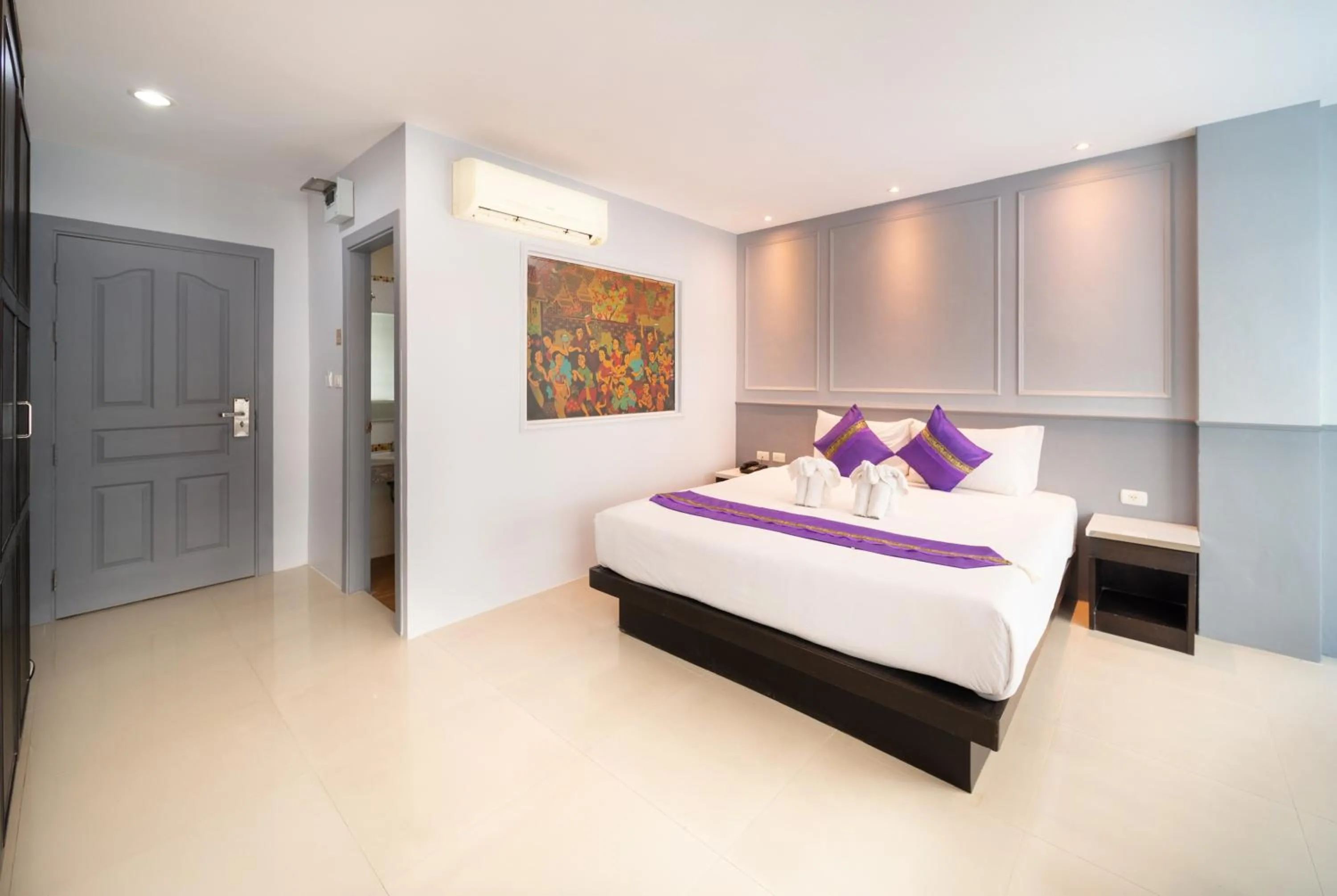 Bed in FunDee Boutique Hotel