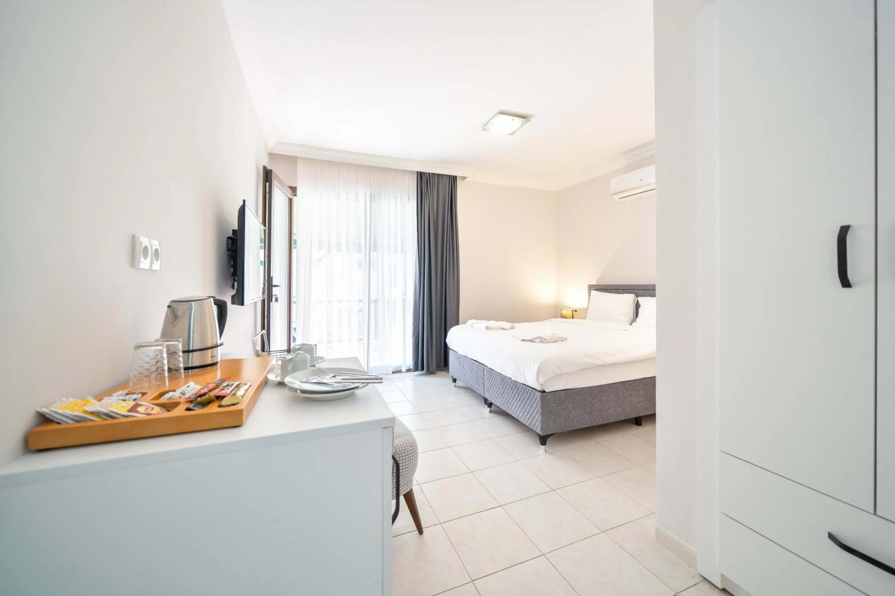 Bed in Dedeminn Garden Hotel