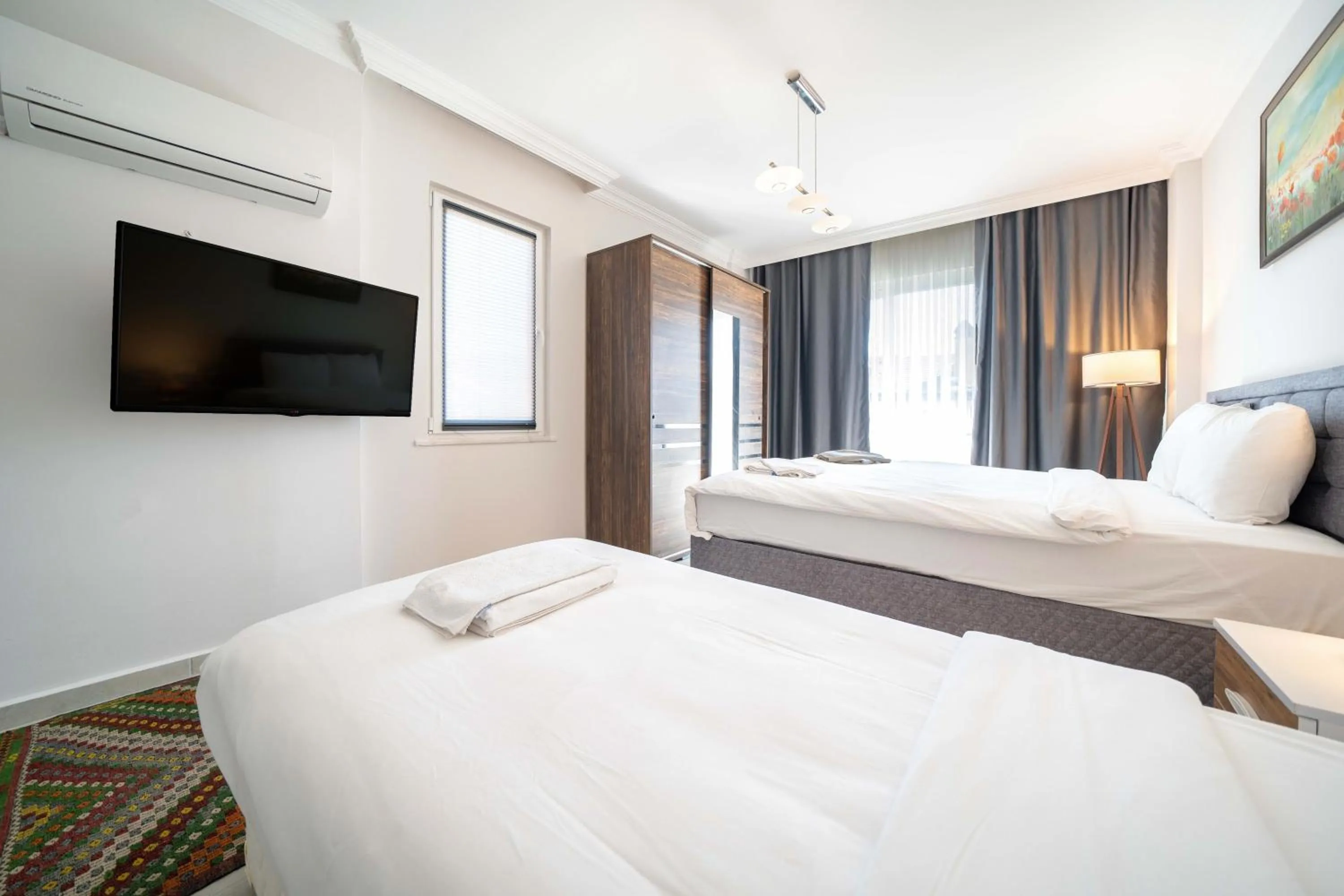 Bed in Dedeminn Garden Hotel