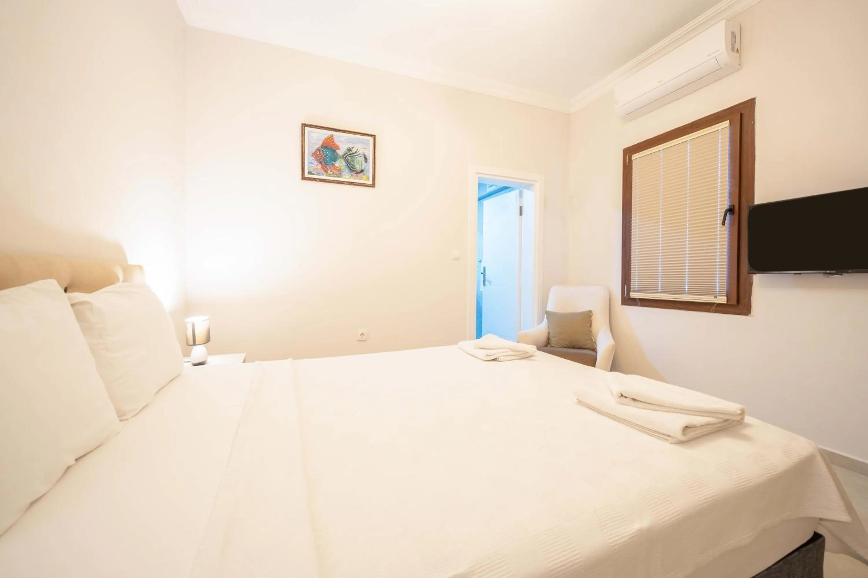 Bed in Dedeminn Garden Hotel