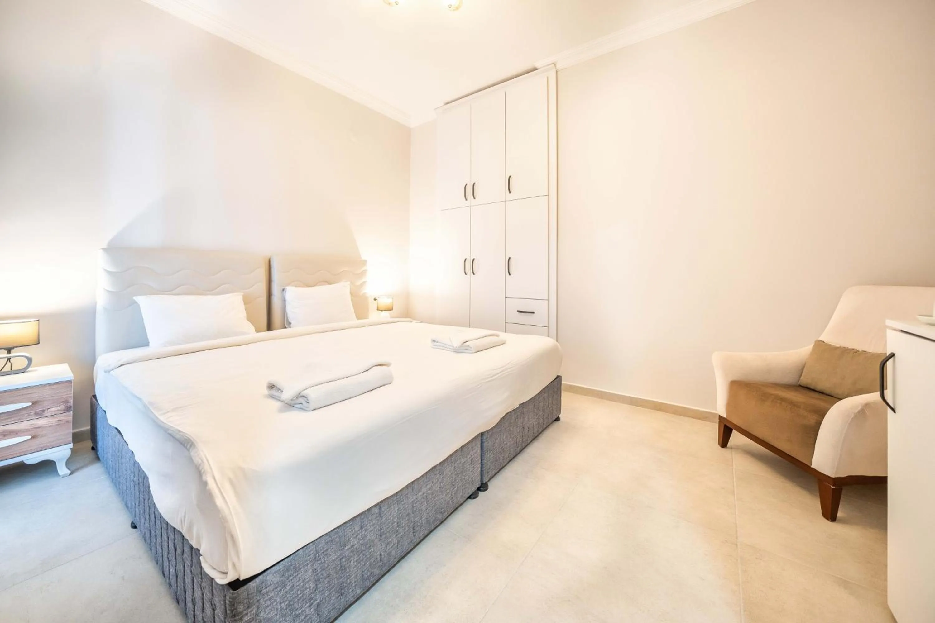 Bed in Dedeminn Garden Hotel