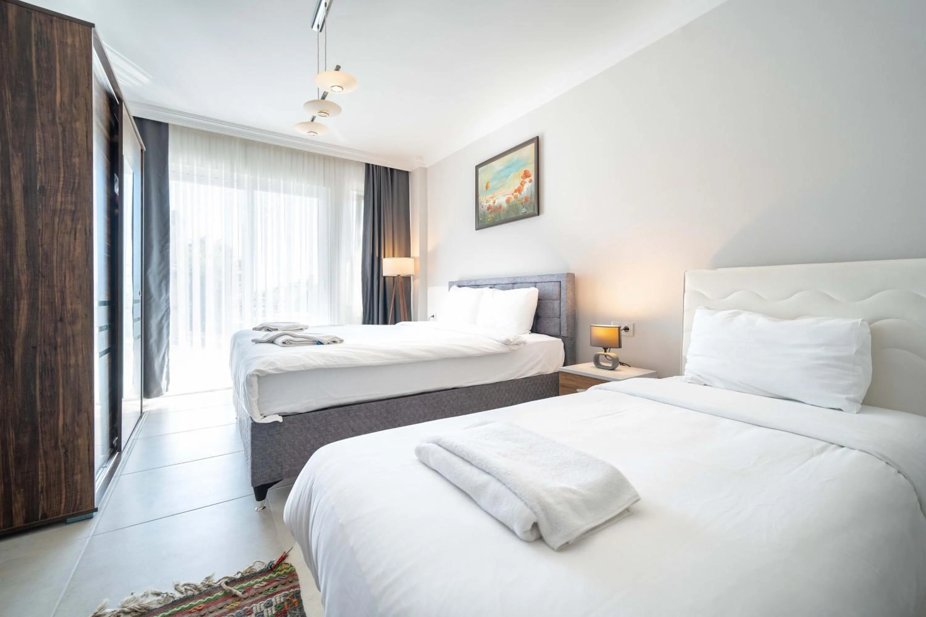 Bed in Dedeminn Garden Hotel