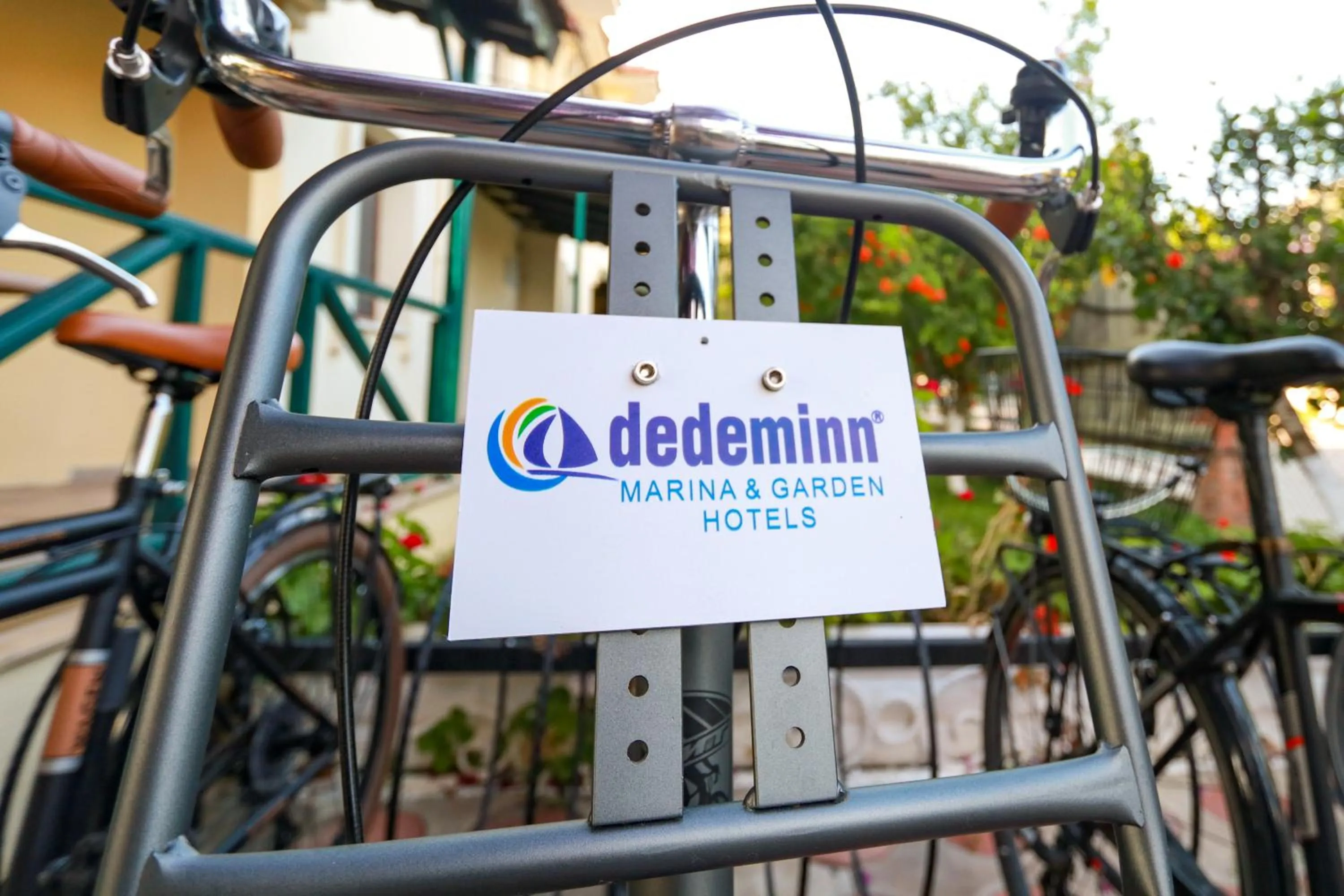 Property logo or sign in Dedeminn Garden Hotel