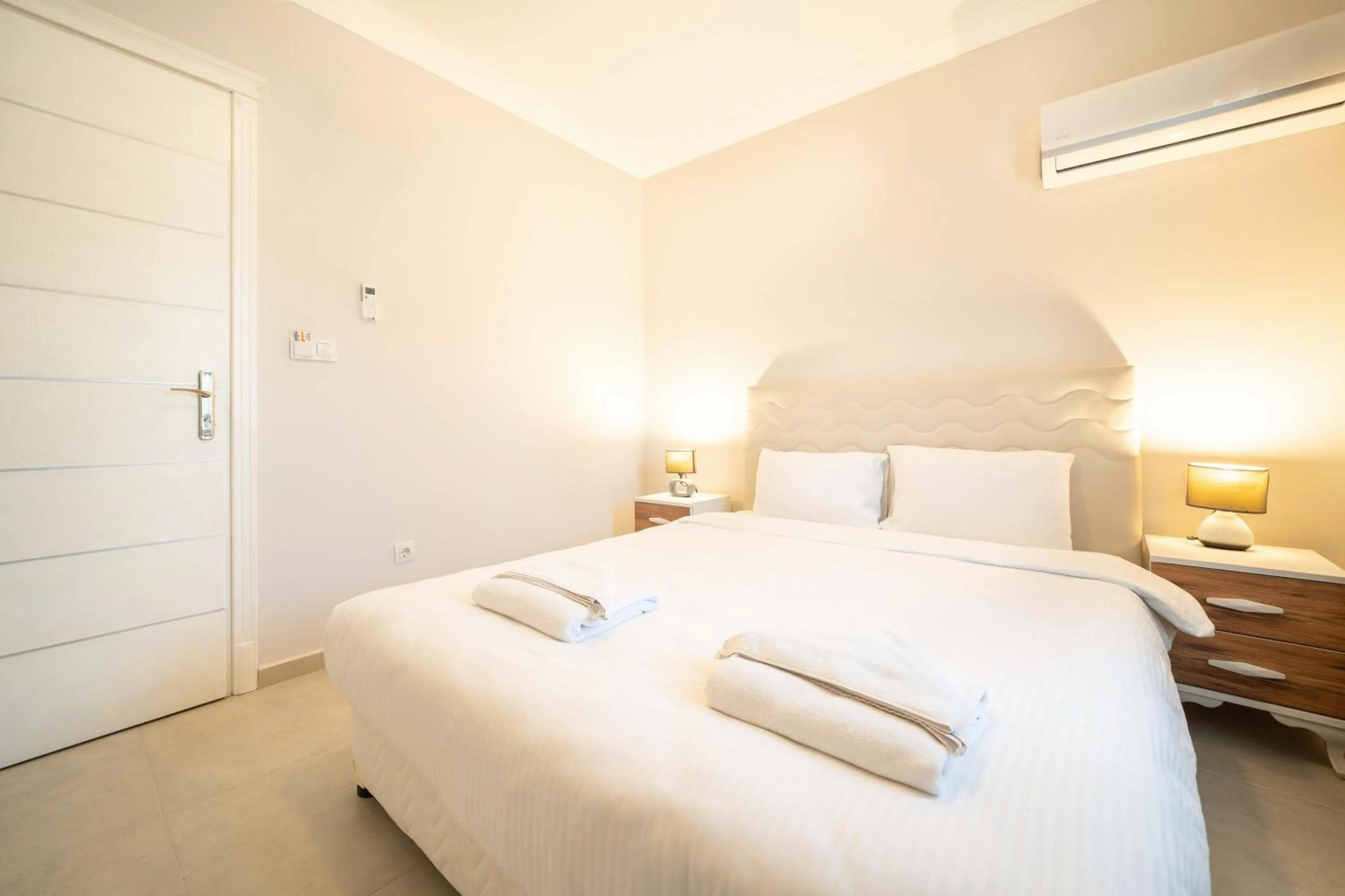 Bed in Dedeminn Garden Hotel