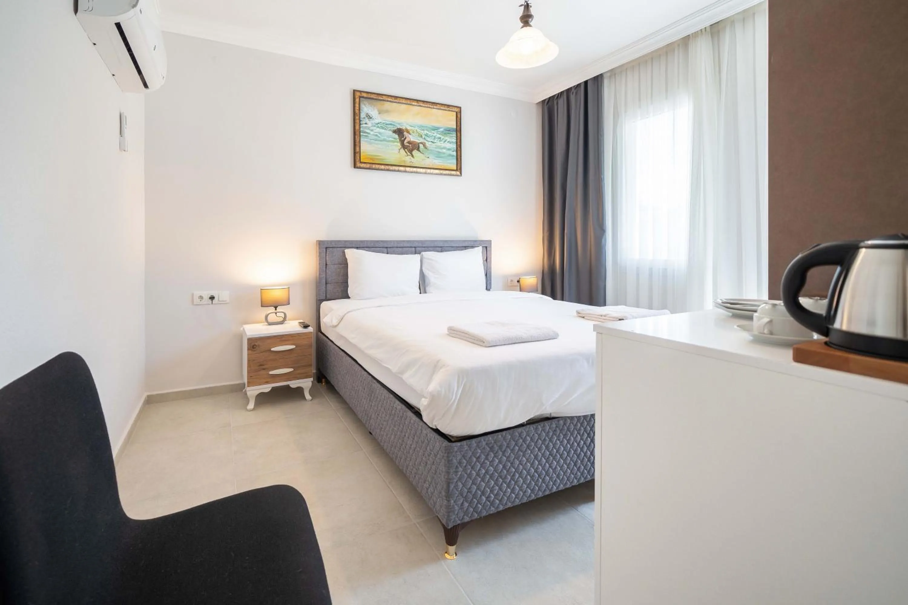 Bed in Dedeminn Garden Hotel